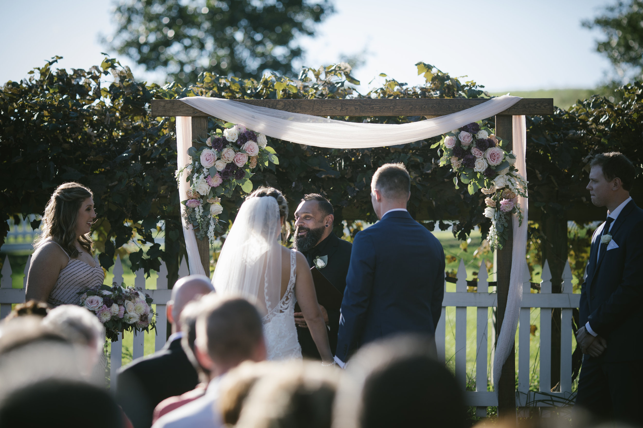 Bride and groom at outdoor wedding ceremony for rustic wedding in Pittsburgh, PA planned by Exhale Events. Find more wedding inspiration at exhale-events.com!