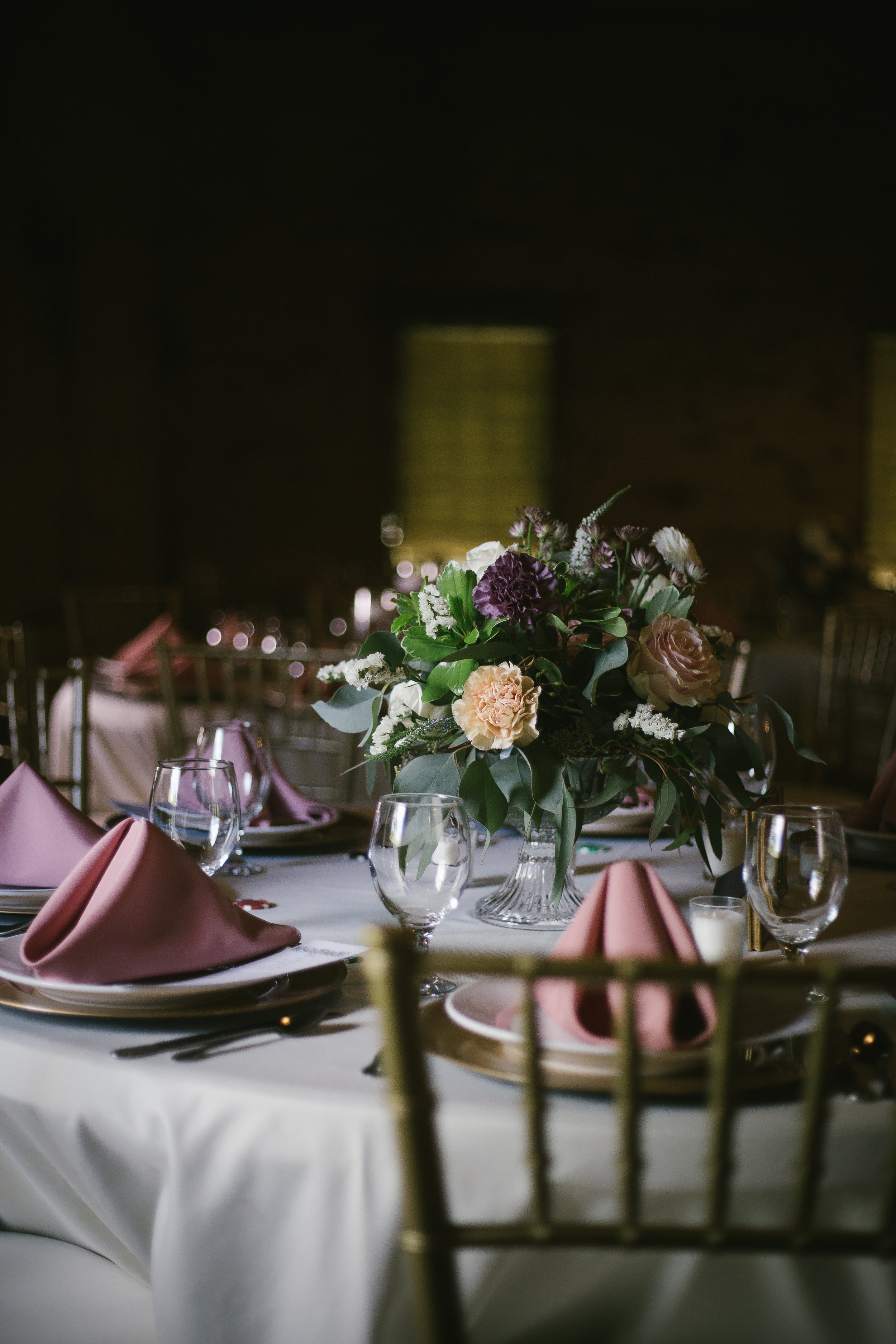 Wedding reception table decor and wedding table setting and wedding centerpiece for rustic wedding in Pittsburgh, PA planned by Exhale Events. Find more wedding inspiration at exhale-events.com!