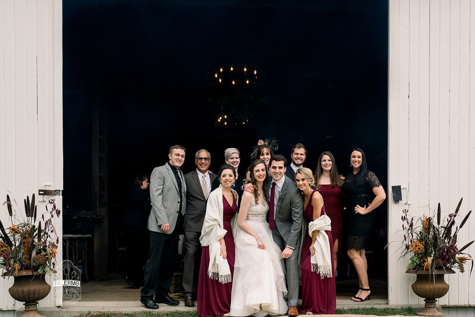 Bride and groom pose for wedding photos at fall barn wedding in Pittsburgh, PA planned by Exhale Events. Find more wedding inspiration at exhale-events.com!