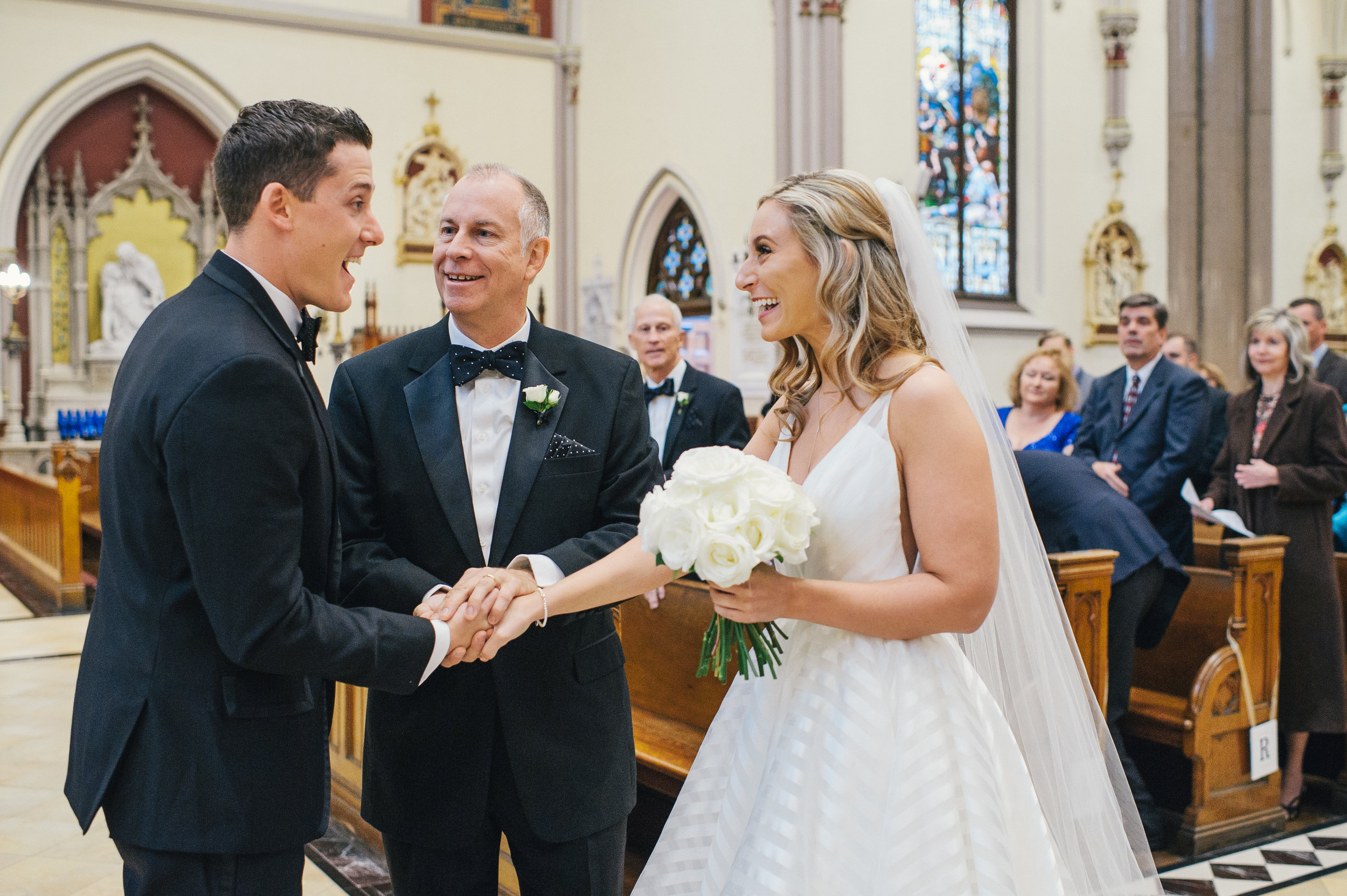 Bride walks down the aisle with her father at the wedding ceremony for black, white, and gold wedding in Buffalo, NY planned by Exhale Events. Find more wedding inspiration at exhale-events.com!
