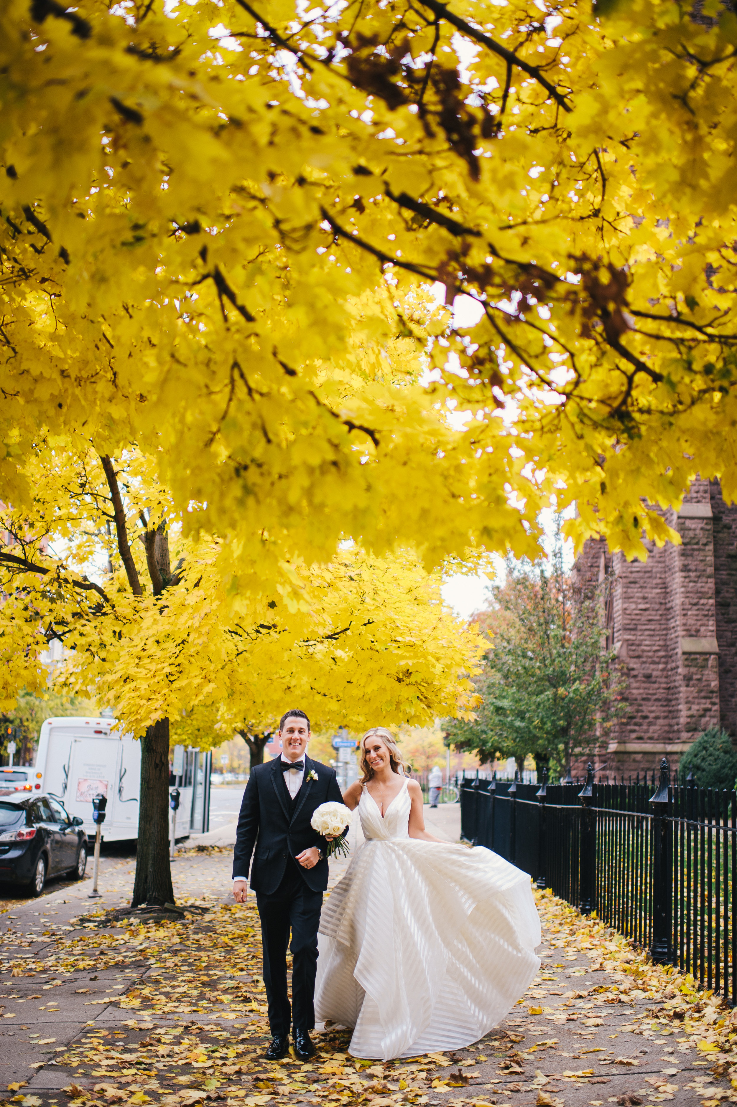 Bride and groom pose for outdoor wedding photos for black, white, and gold wedding in Buffalo, NY planned by Exhale Events. Find more wedding inspiration at exhale-events.com!