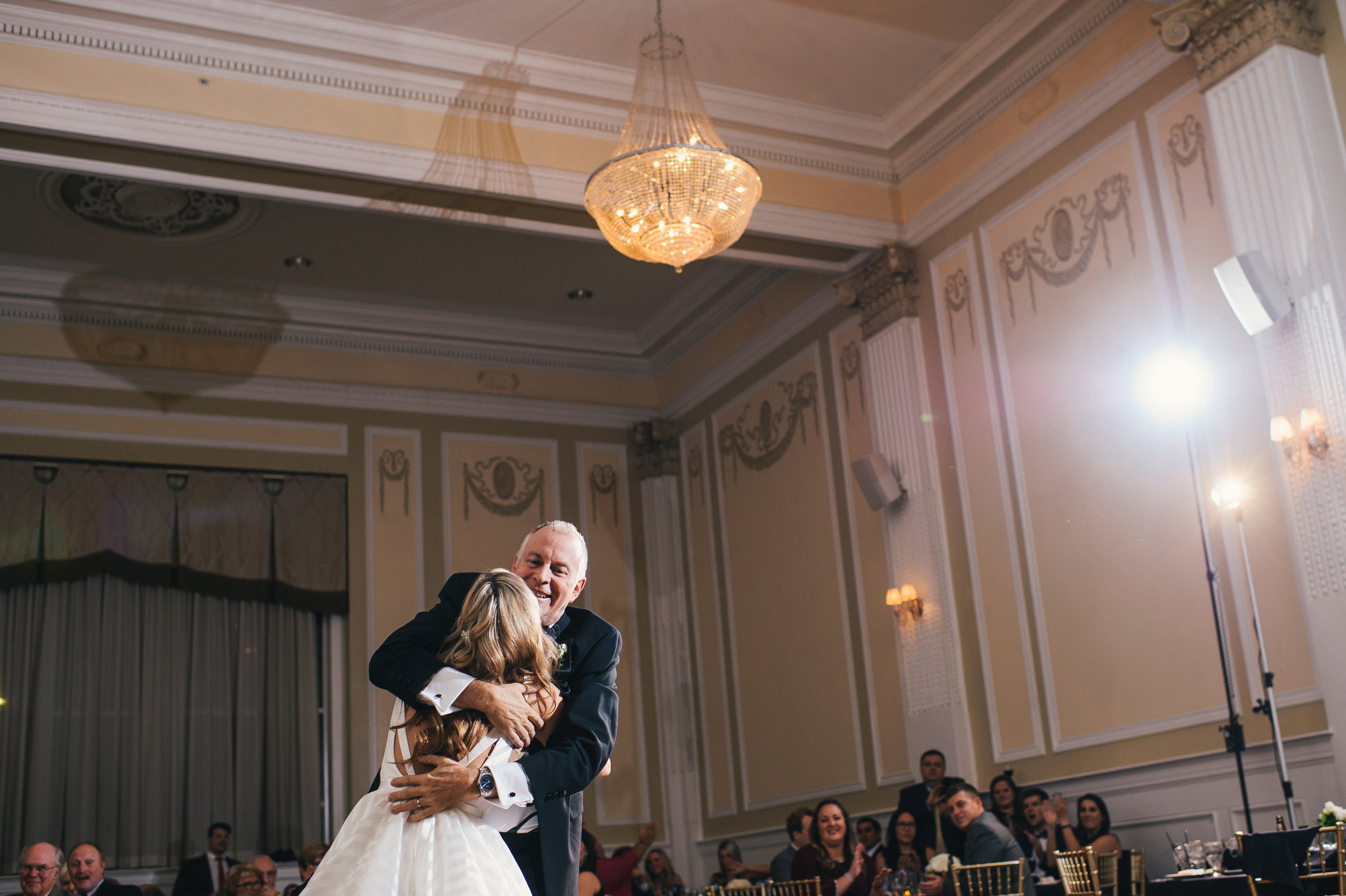 Bride and her father share their father/daughter dance for black, white, and gold wedding in Buffalo, NY planned by Exhale Events. Find more wedding inspiration at exhale-events.com!