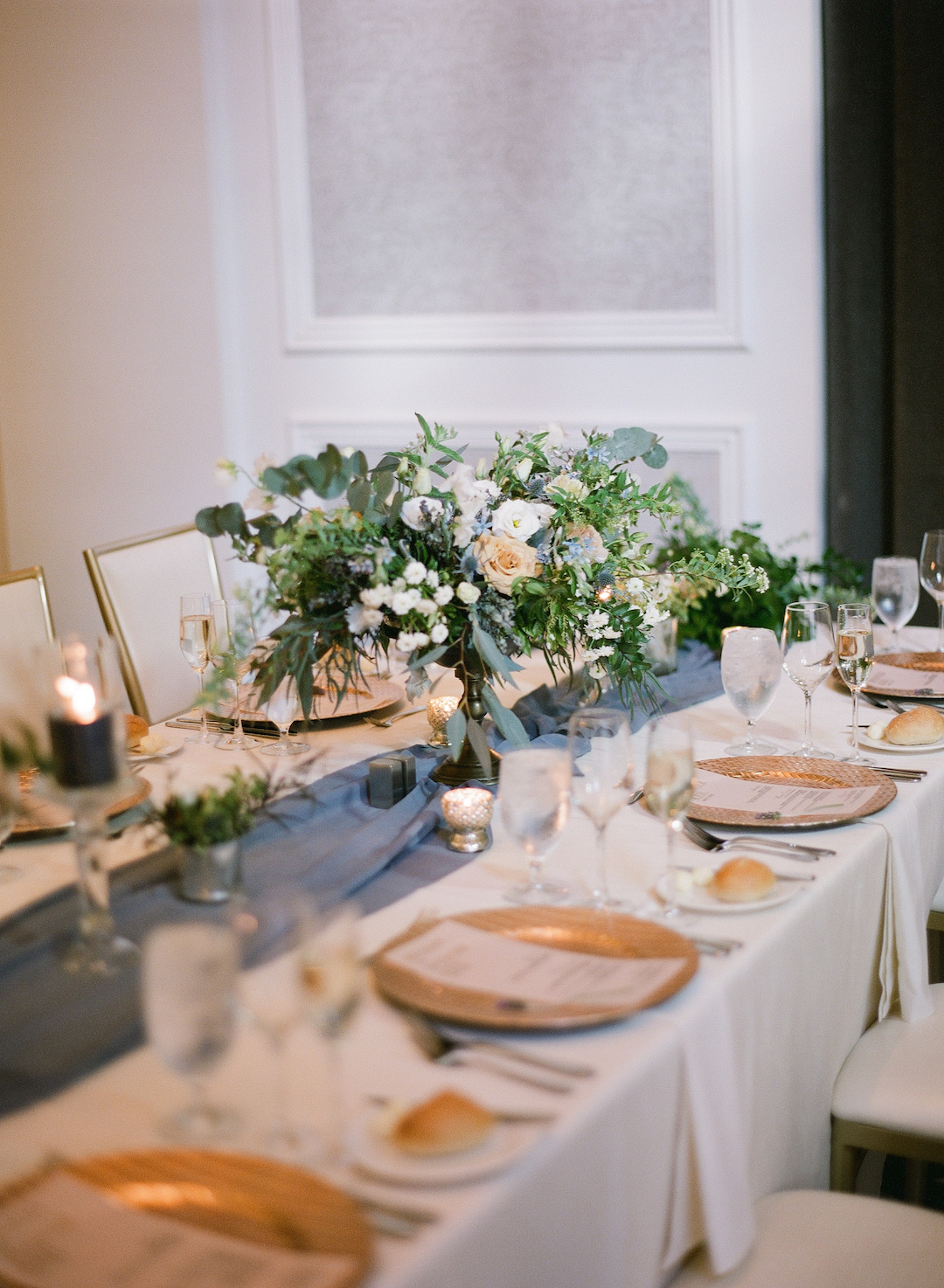Low wedding centerpieces for Pittsburgh wedding at Hotel Monaco planned by Exhale Events. Find more modern wedding ideas at exhale-events.com!