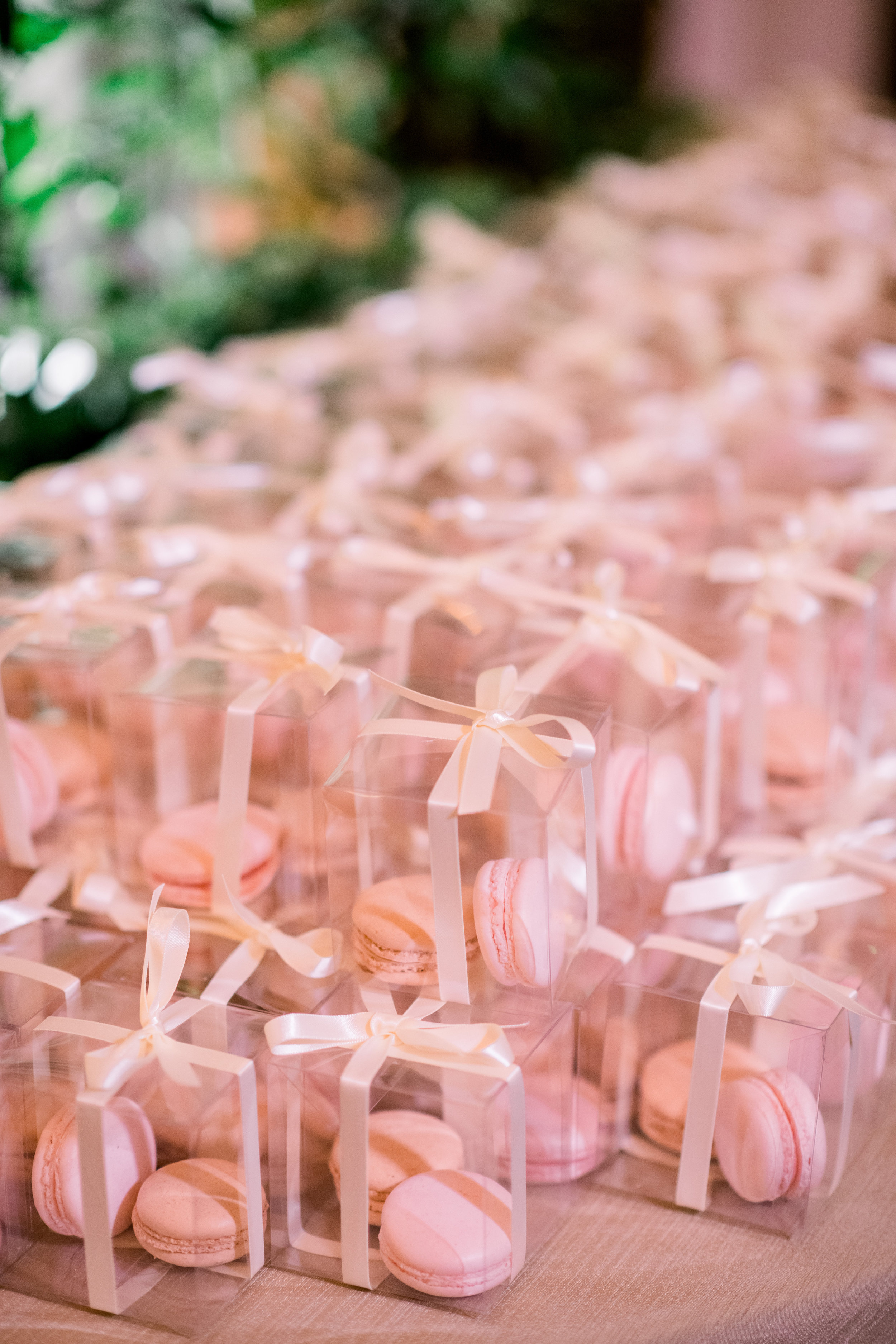 Pink macaron wedding favors for Pittsburgh wedding at Hotel Monaco planned by Exhale Events. Find more modern wedding ideas at exhale-events.com!