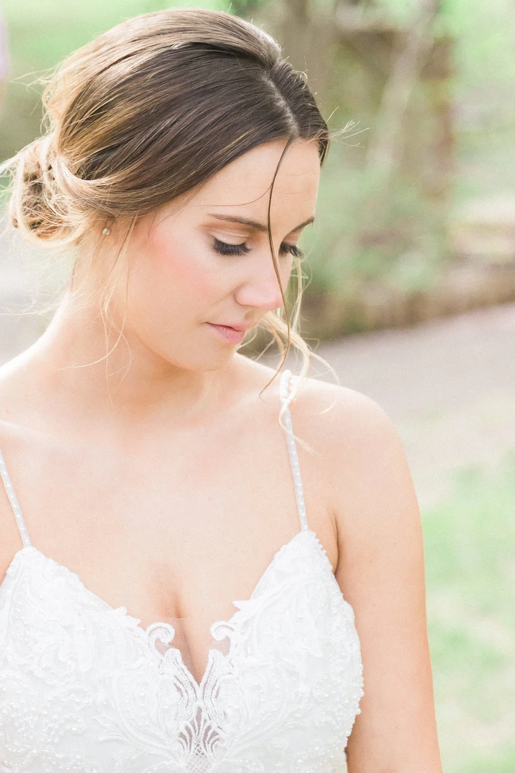 Bride's wedding updo and soft bridal makeup for chic wedding in Buffalo, NY planned by Exhale Events. Find more timeless wedding inspiration at exhale-events.com!