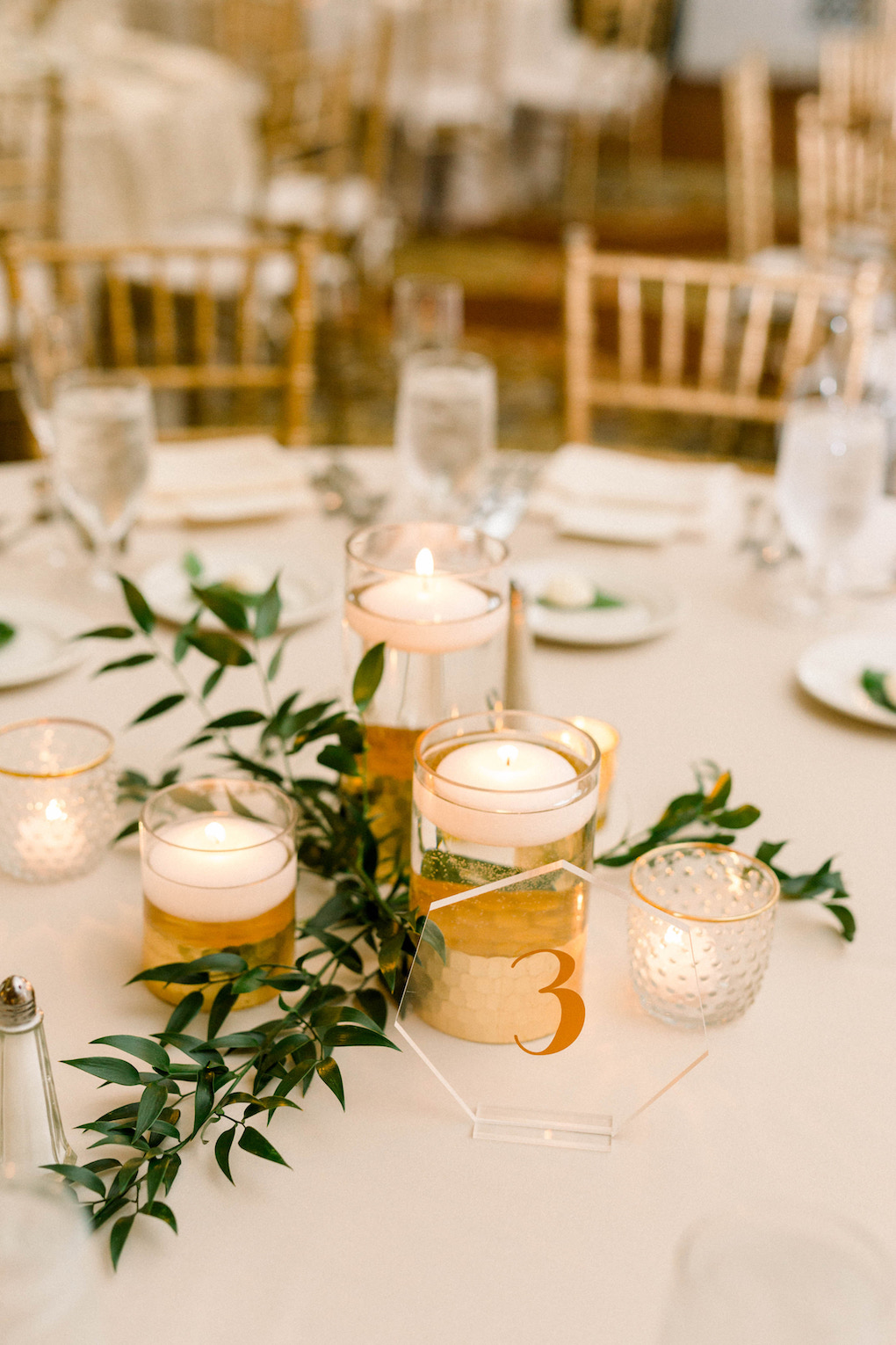 Greenery and gold wedding centerpieces: Romantic Fairytale wedding at the Omni William Penn in Pittsburgh, PA planned by Exhale Events. Find more wedding inspiration at exhale-events.com!