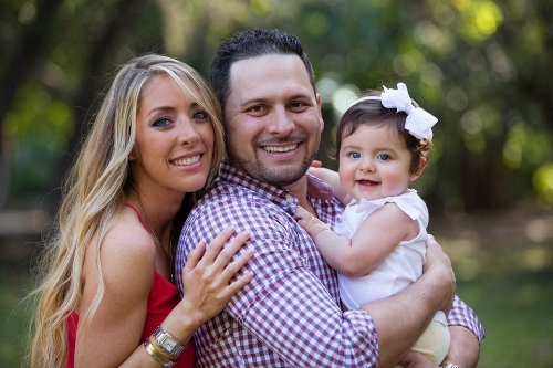 Ella and her parents.