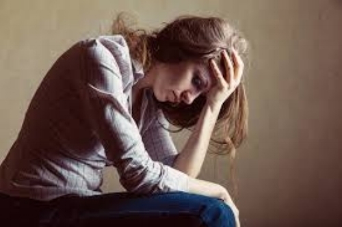 woman with head in hands.jpeg