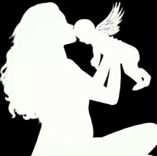This silhouette of a mother kissing her angel baby is a favorite image of Kristen's. 