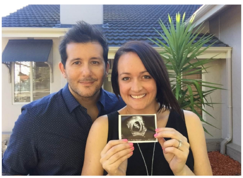 Adele Barbaro and her husband, Paul, with an ultrasound photo of their son, Harvey.