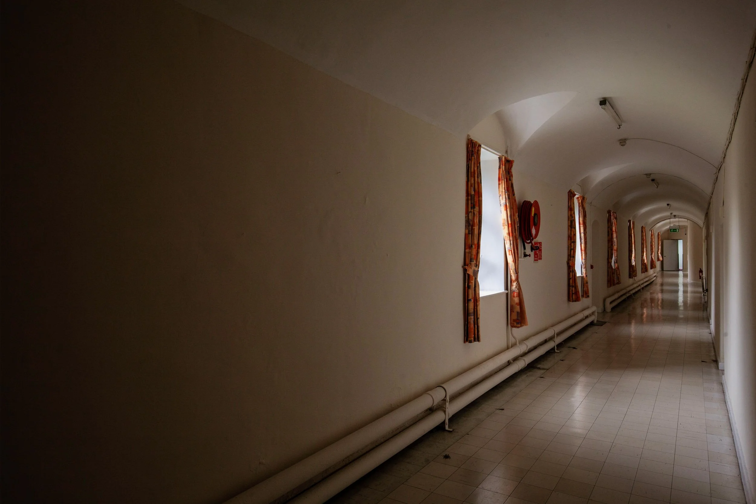   St. Fintan's Hospital, Portlaoise (previously Maryborough District Lunatic Asylum)   Est: 1833 - Currently in operation (partially)  Ground floor cells and ward corridor, all asylums of that era were vaulted throughout solid masonry, principally as