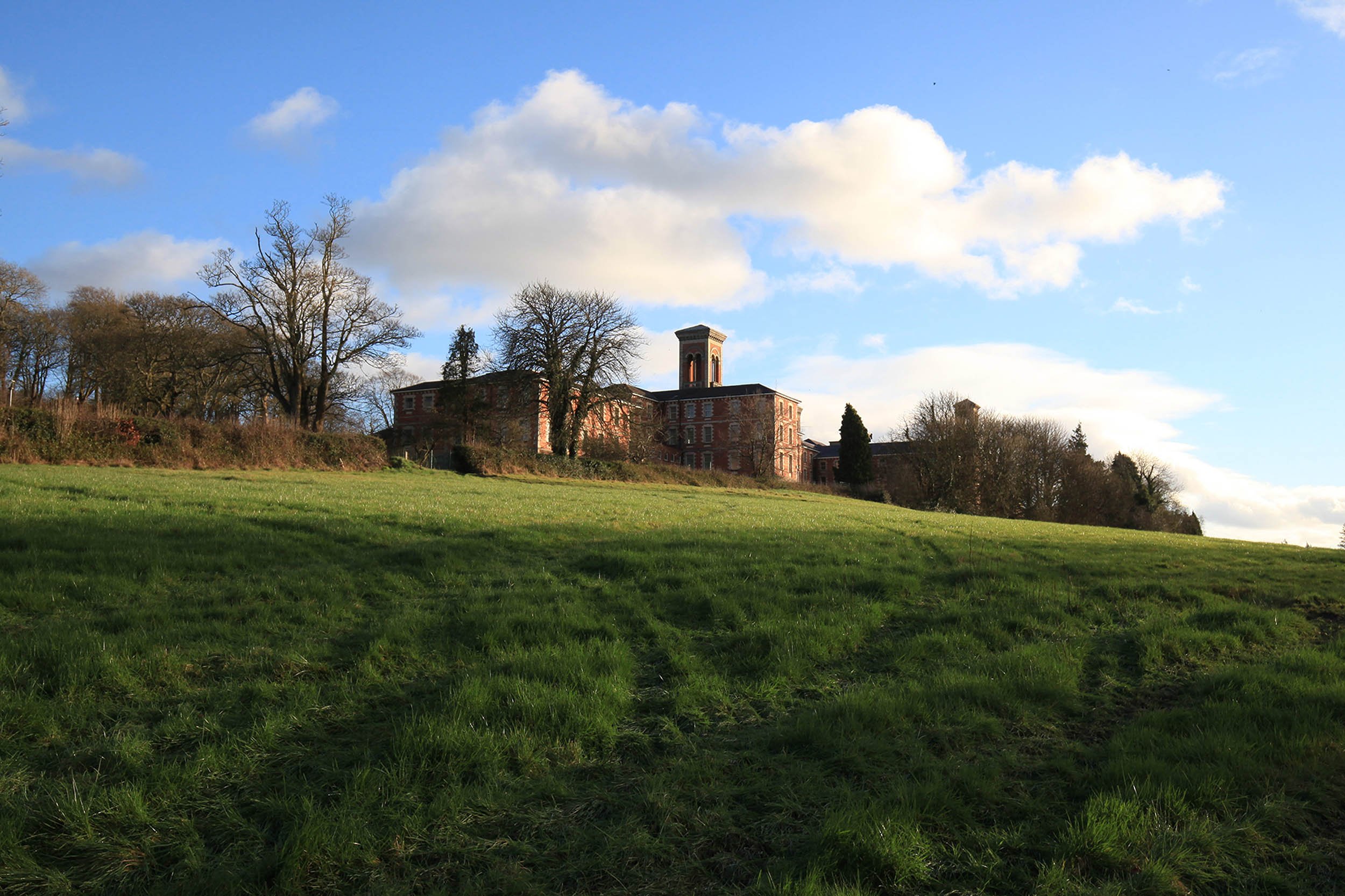   St. Senan's Hospital, Enniscorty (previously Enniscorty District Lunatic Asylum)   Est: 1868 – Closed: 2013  Enniscorthy Hospital is distinctive for its exterior brickwork—made from clay excavated directly from the site on which it stands—and for i