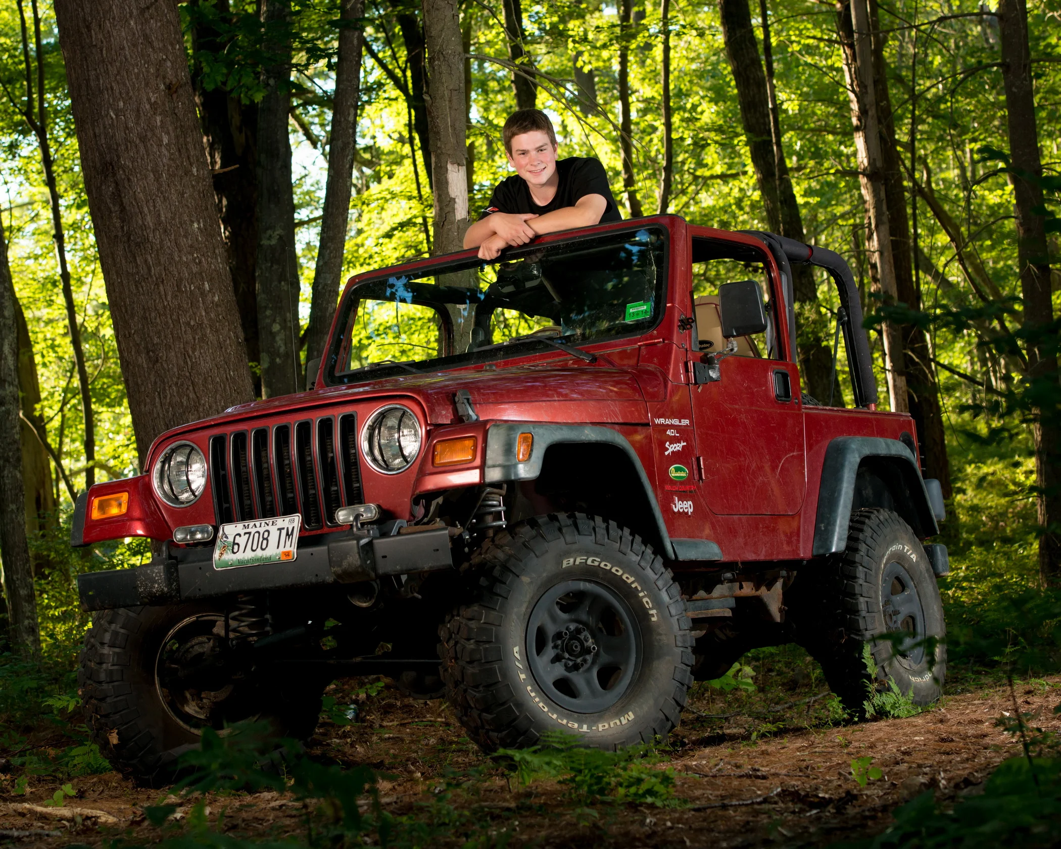 High School Senior Picture with his Jeep