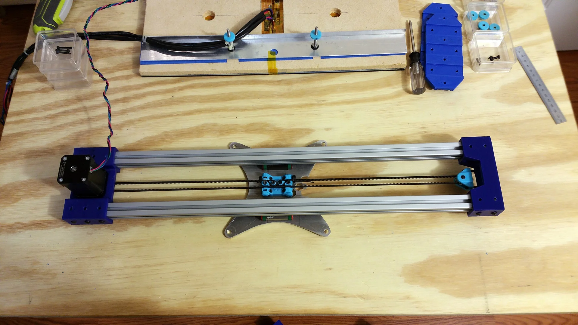 Bottom of the Y-Axis. The belt runs underneath the Carriage Plate