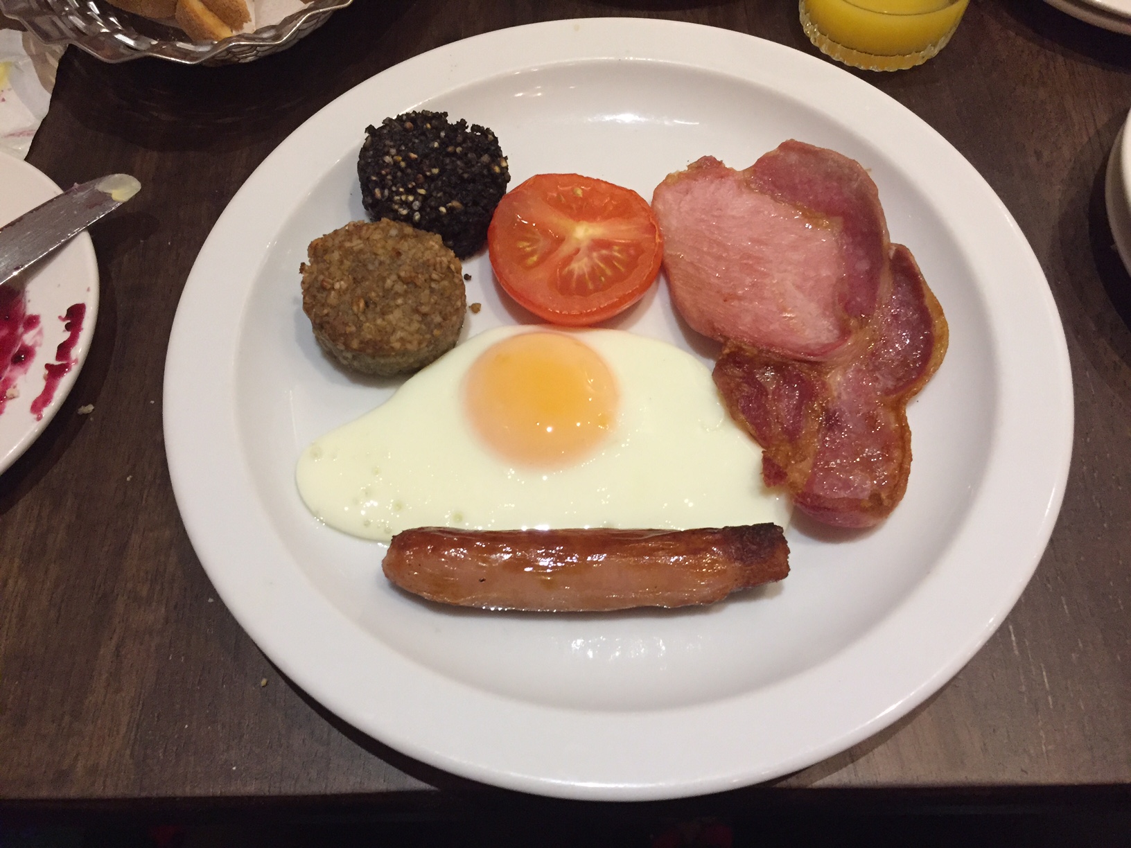 Black & white pudding is often served with breakfast in Ireland and looks a lot like little pucks on your plate. Black pudding in made from a type of blood sausage and white is much the same just minus the blood. They are an acquired taste for some. The jury is still out on this one.