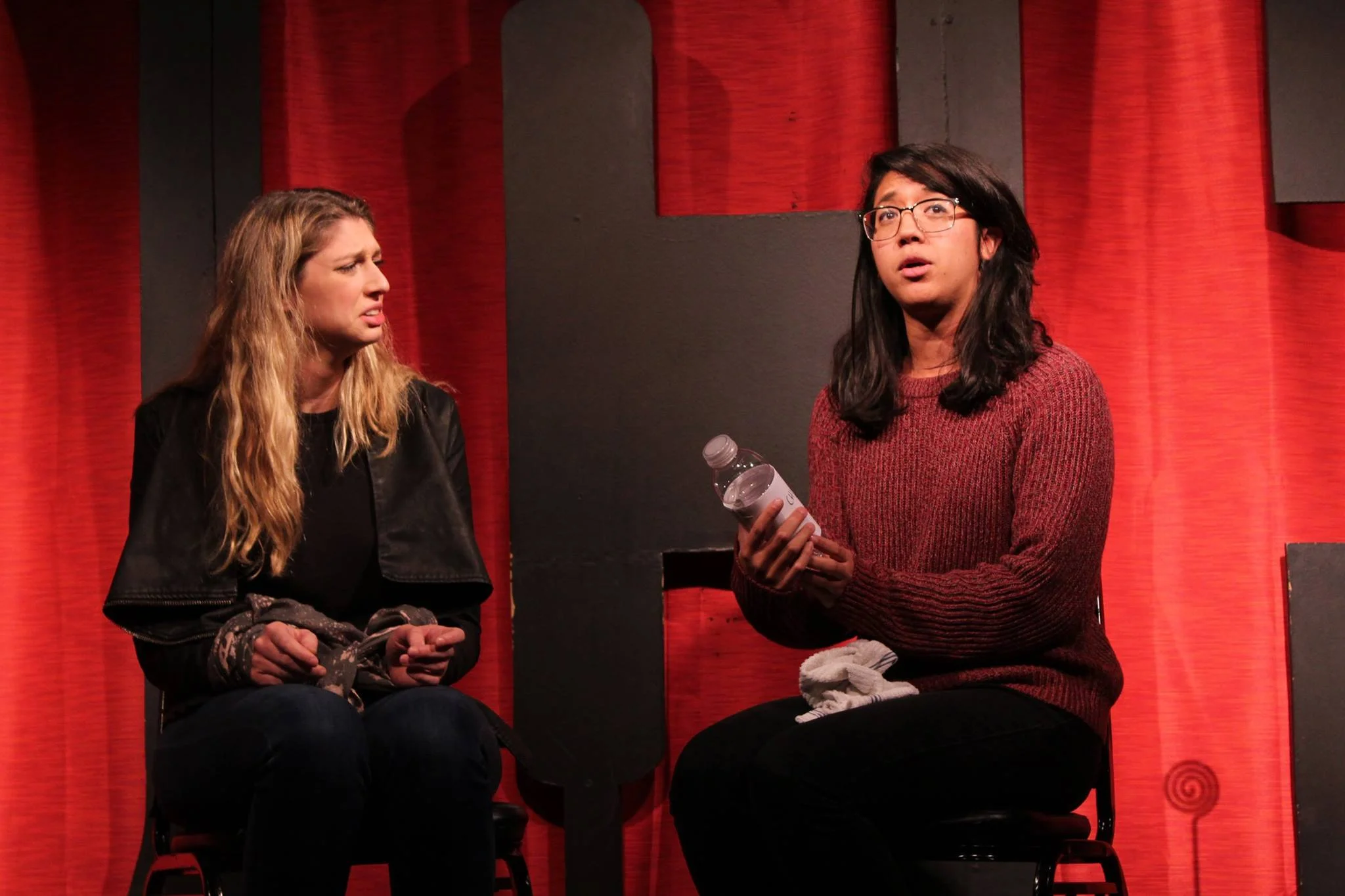 Bonnie Criss and Marilou Canon performing a satirical piece about internet instructional videos.
