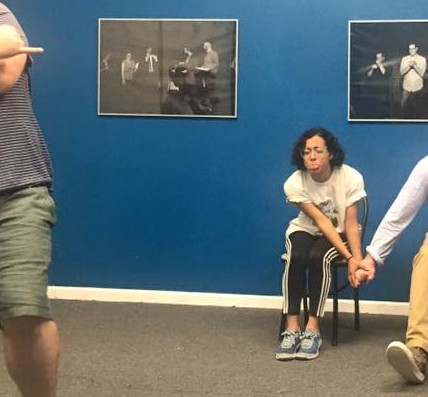 Kirstie acting blue during an improv practice. 