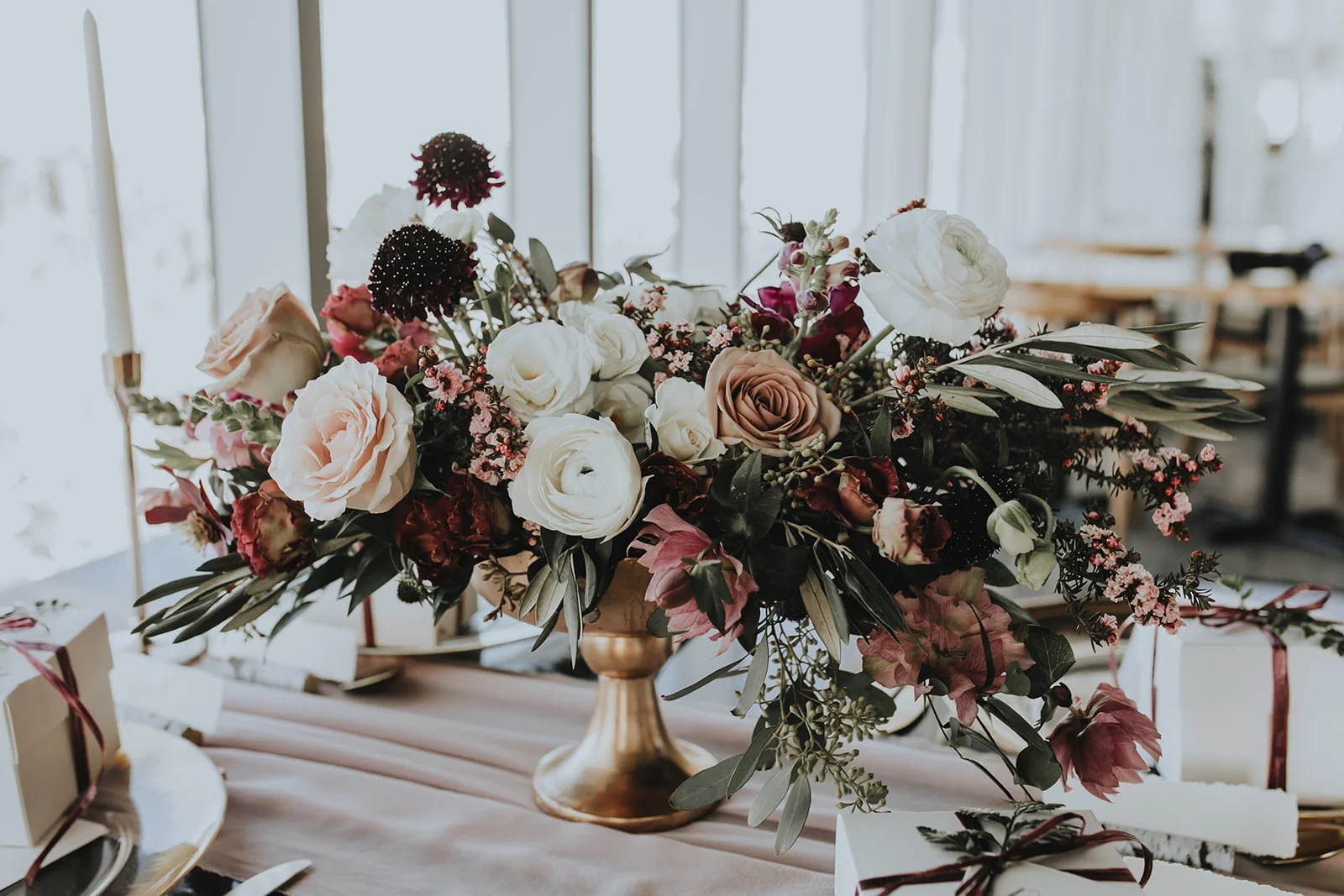 Wedding centerpiece at Sky Bistro Banff Gondola, Flowers by Janie.jpg