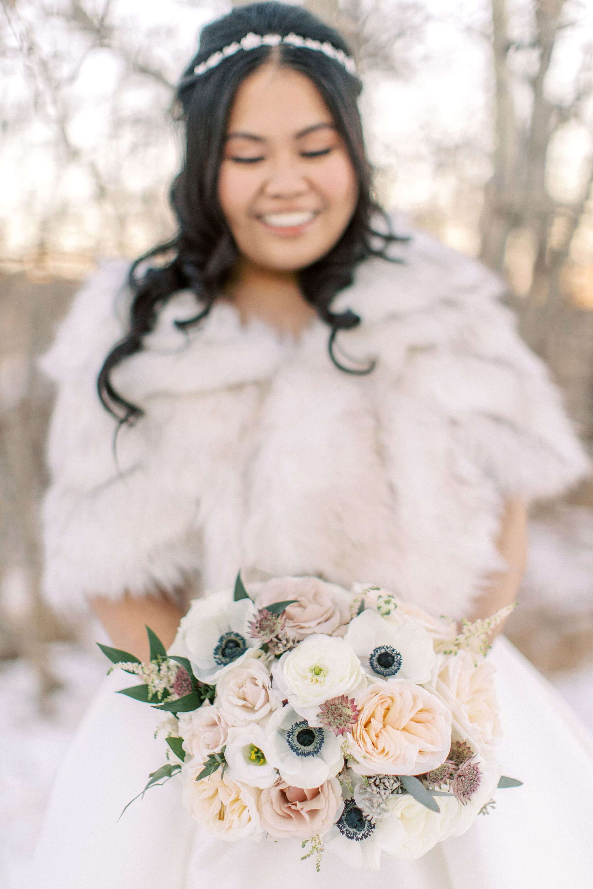 Bride with stunning blush winter bouquet, Flowers by Janie.jpg