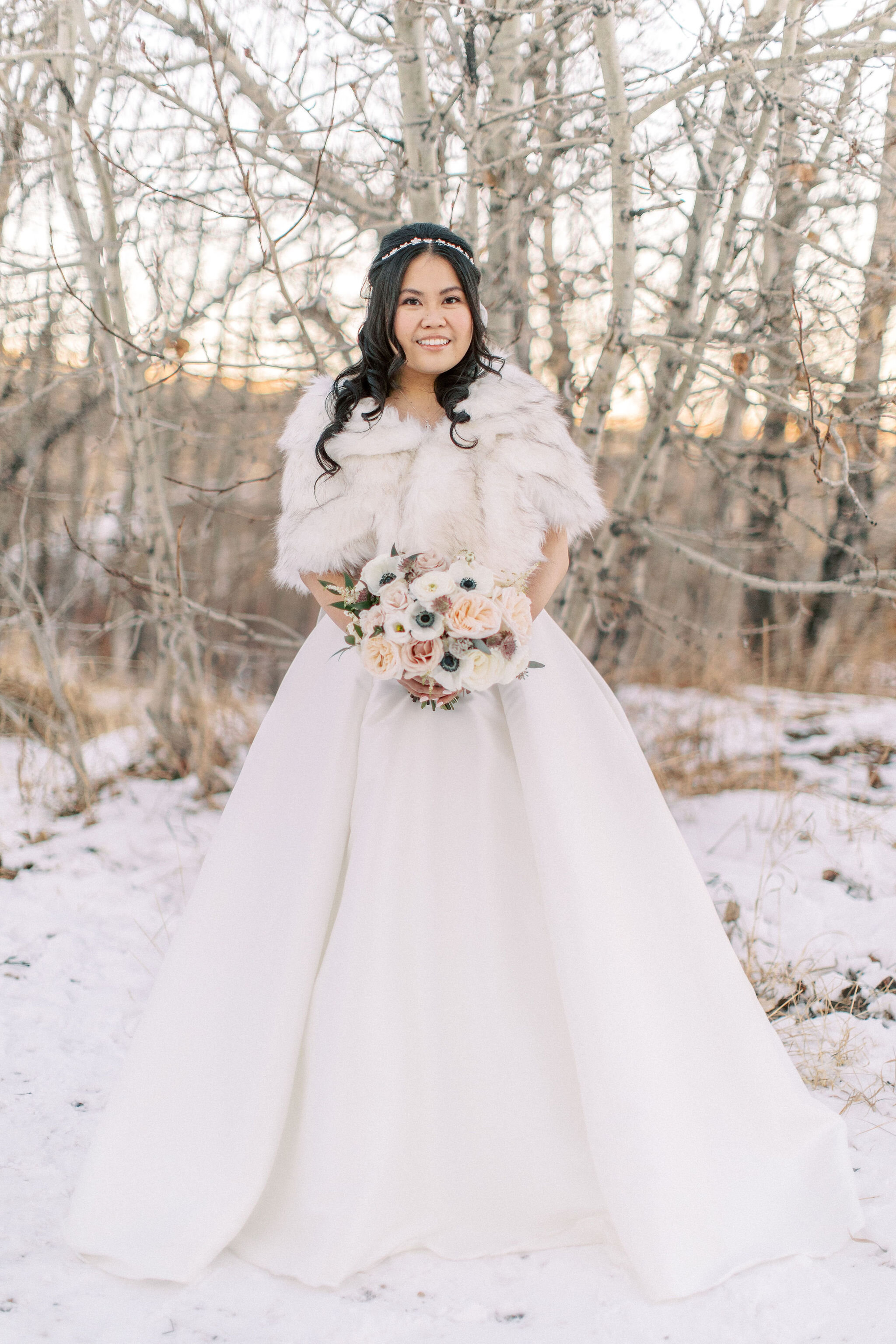 Winter bride with panda anemone bouquet, Flowers by Janie, Calgary weddings.jpg