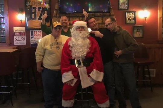 Tired of the elves and all their bullshit, Santa took a break from his merrymaking and dropped in at the Hiland Bar. We suspect we are all getting beers in our stockings this year. Santa essentially backed up Prophet’s predication with a, “Ho Ho Ho.”