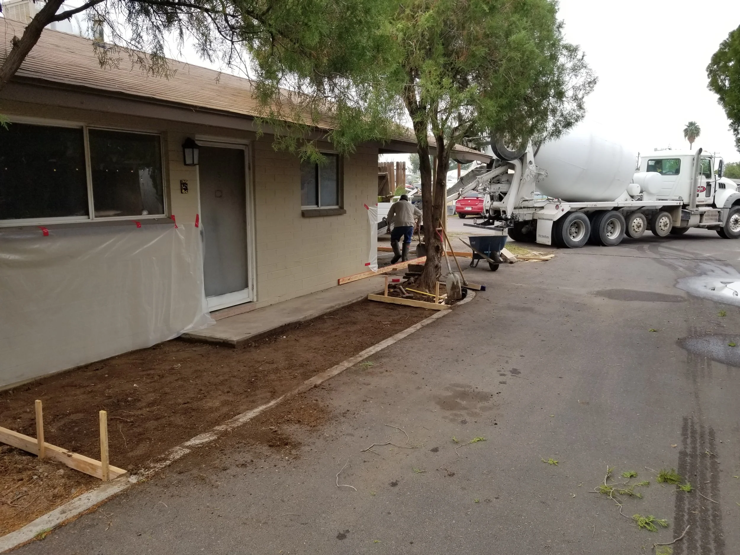 Pouring the concrete for new front patio