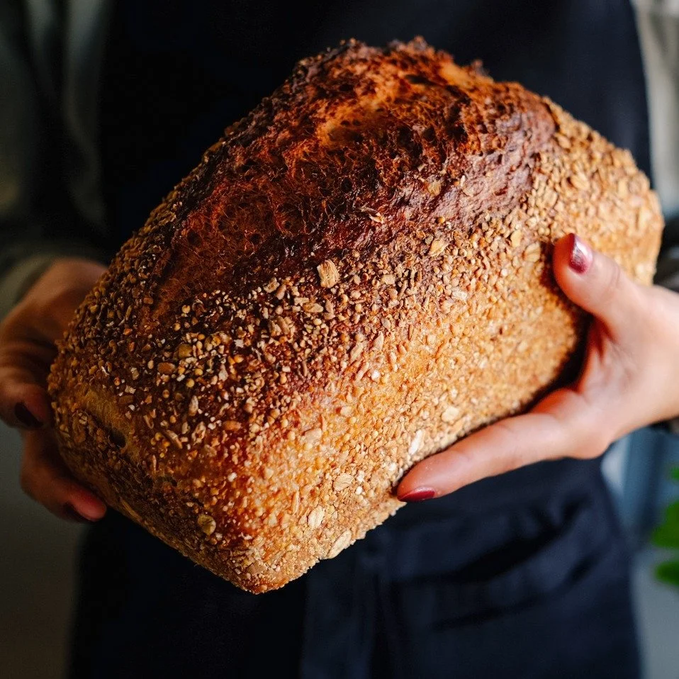 Spring is finally starting to show up in WNC &mdash; longer days, warmer afternoons, and a pretty good excuse to get outside.
If a picnic is in your plans, we&rsquo;ve got plenty of good things to bring along: fresh breads, buttery scones, Brezels, a