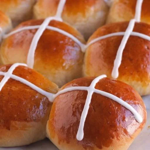 Hot cross buns are back.
We only make these once a year, and they&rsquo;re always worth the wait. Soft, lightly sweet, and filled with golden raisins, currants, and warm spices &mdash; no candied fruit here, just naturally dried fruit that lets the f