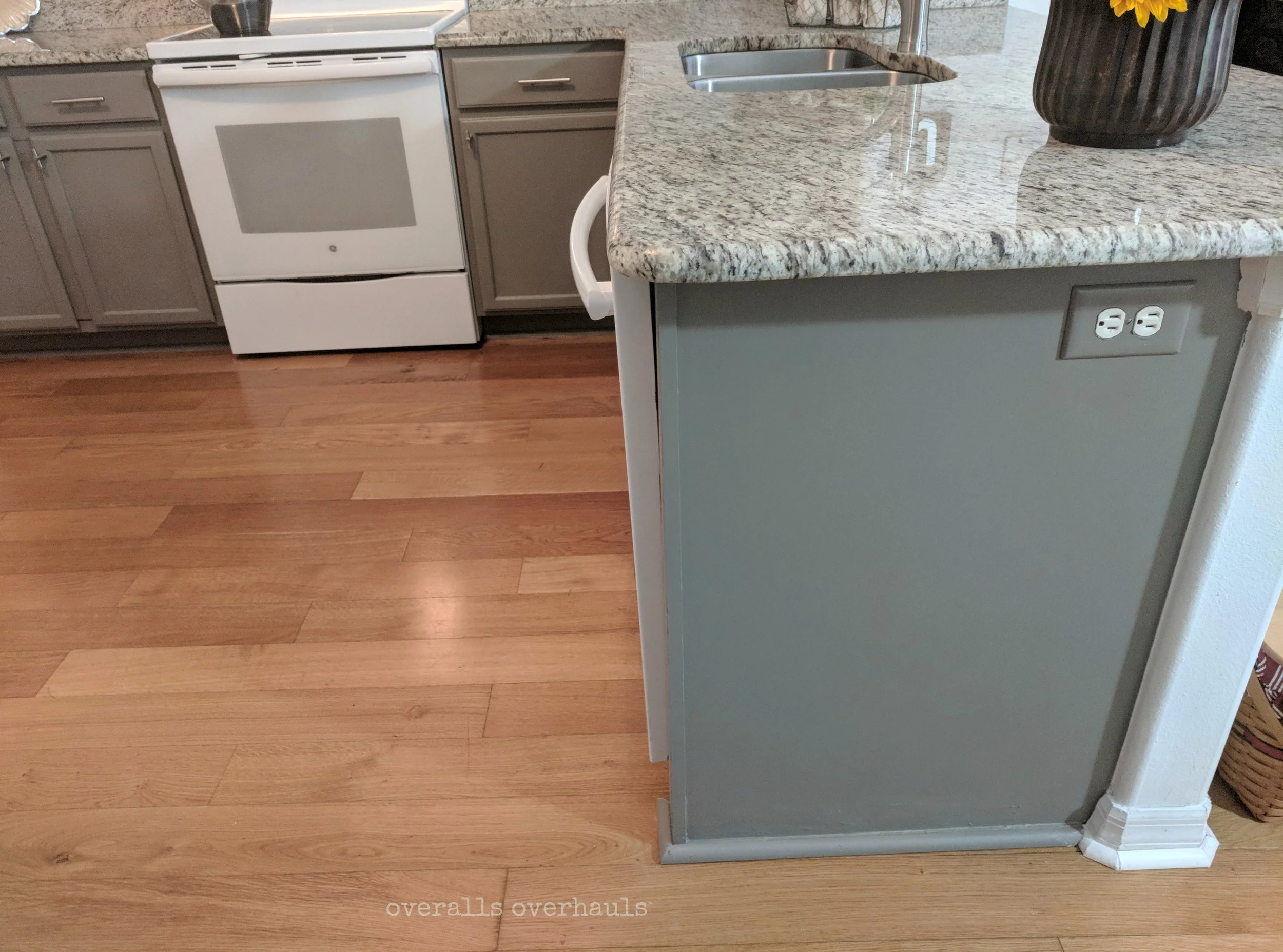 We repaired some old water damage on the floor and added new molding on this end panel. 