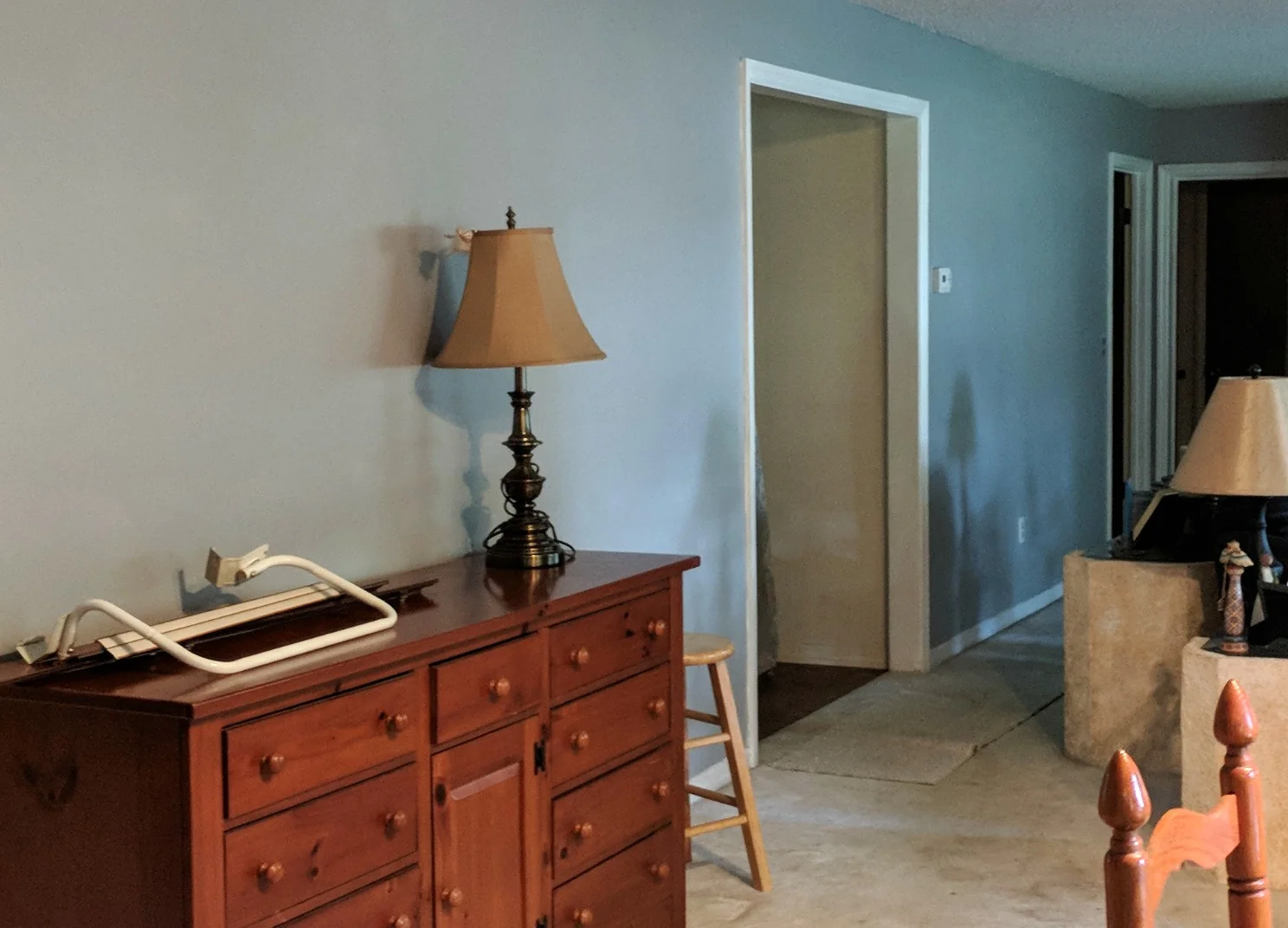 Here is an after of the living room. It's not this blue - more of a silvery gray. My bad for not bringing good lights. Still, the house is refreshed and ready for whatever changes are to come! 