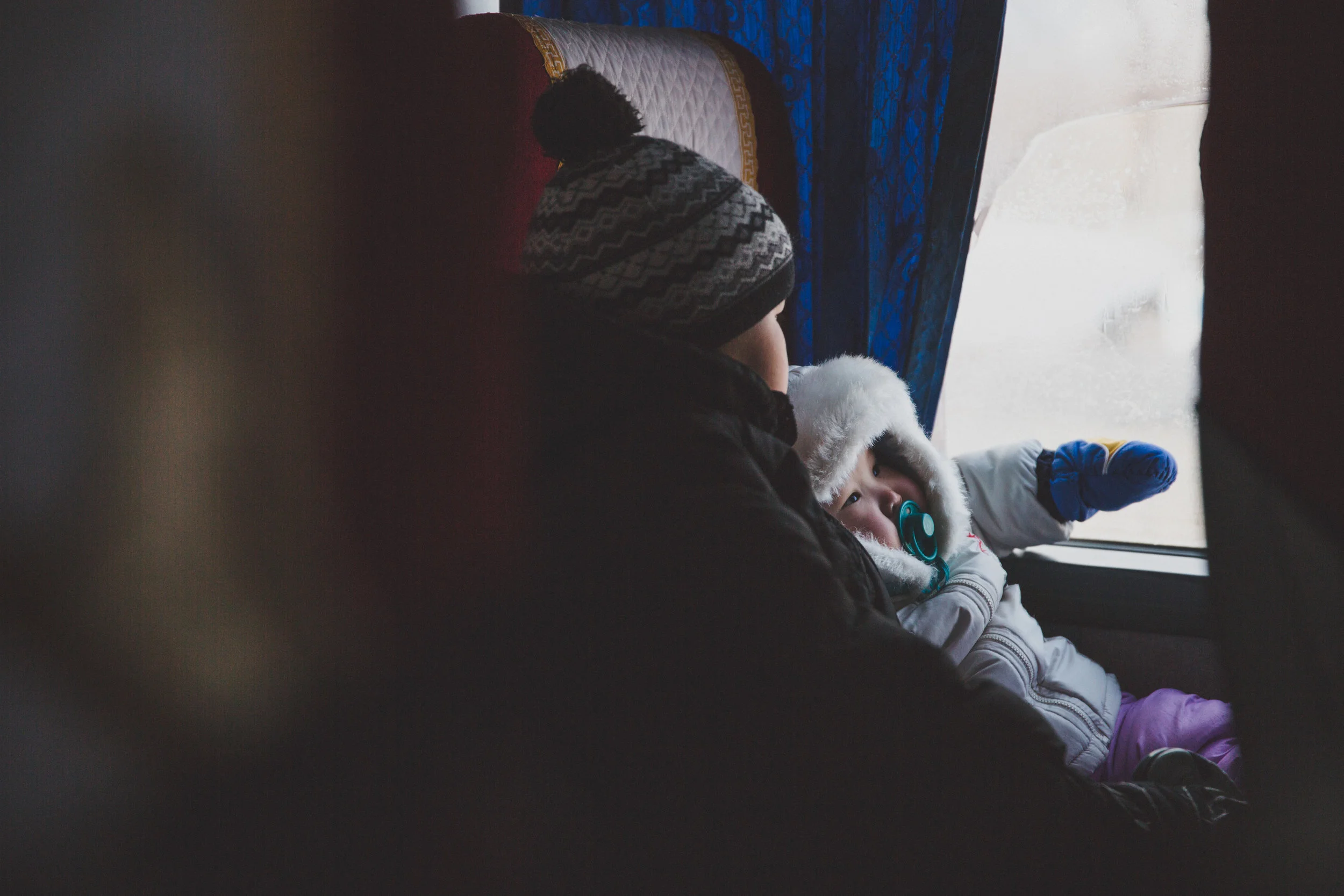 Siblings on the bus between Milkovo and Esso, Kamchatka, Russia. Photo: Robyn Penn. 
