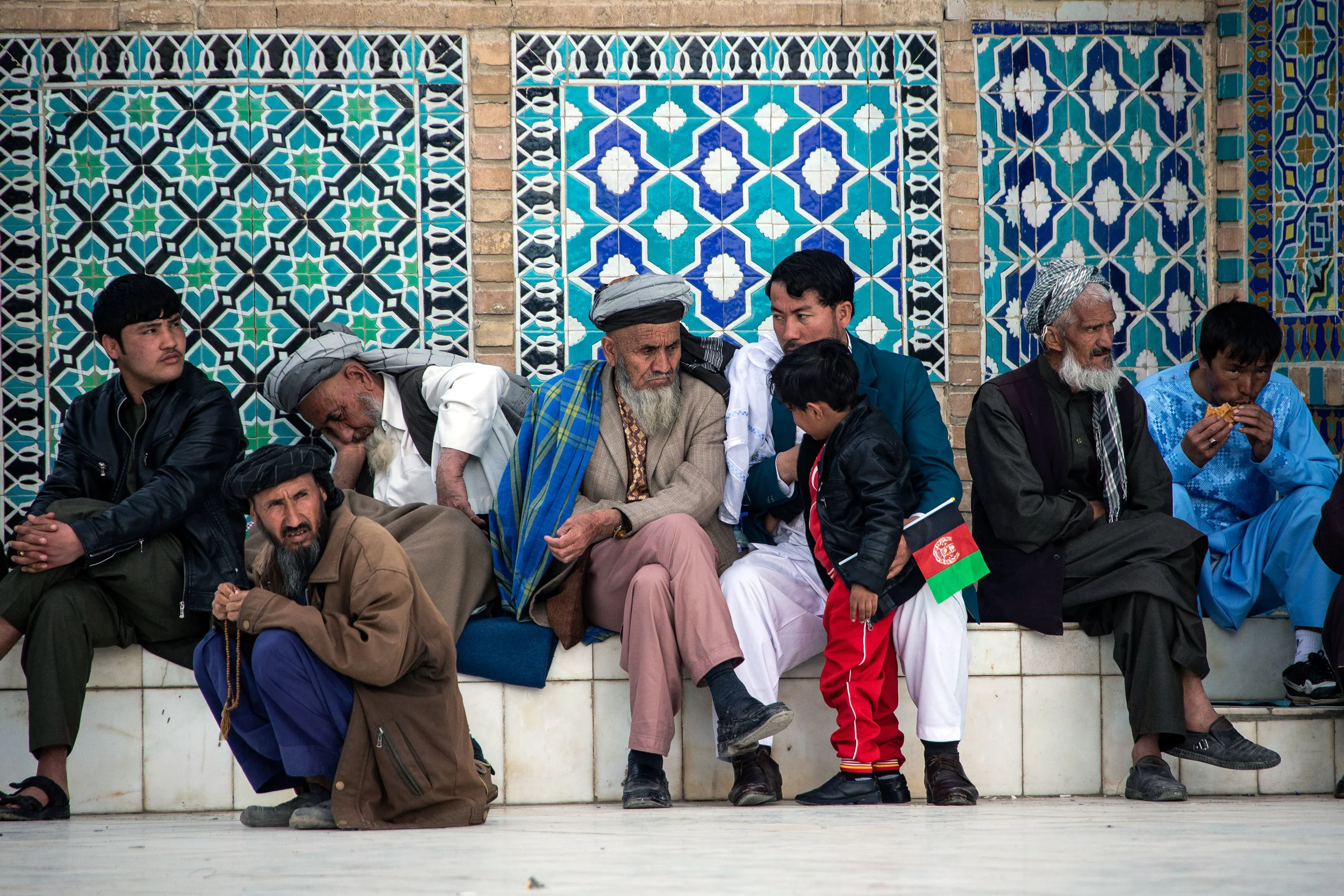 generations-of-afghanistani-men-in-mazari-sharif-blue-mosque-ali.jpg