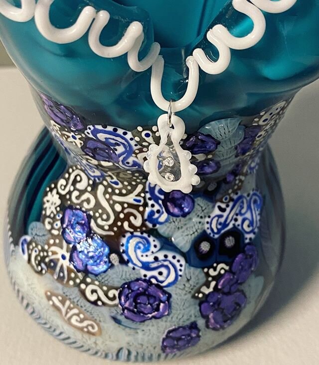 It&rsquo;s all in the #details Closeup of finished #blownglass #corsetvase collaboration with @stothetodd with #murrini hand painted #enamels and #flameworked #borosilicateglass edge #lace and #glass charm with #cubiczirconiacrystals #glasscorset #co