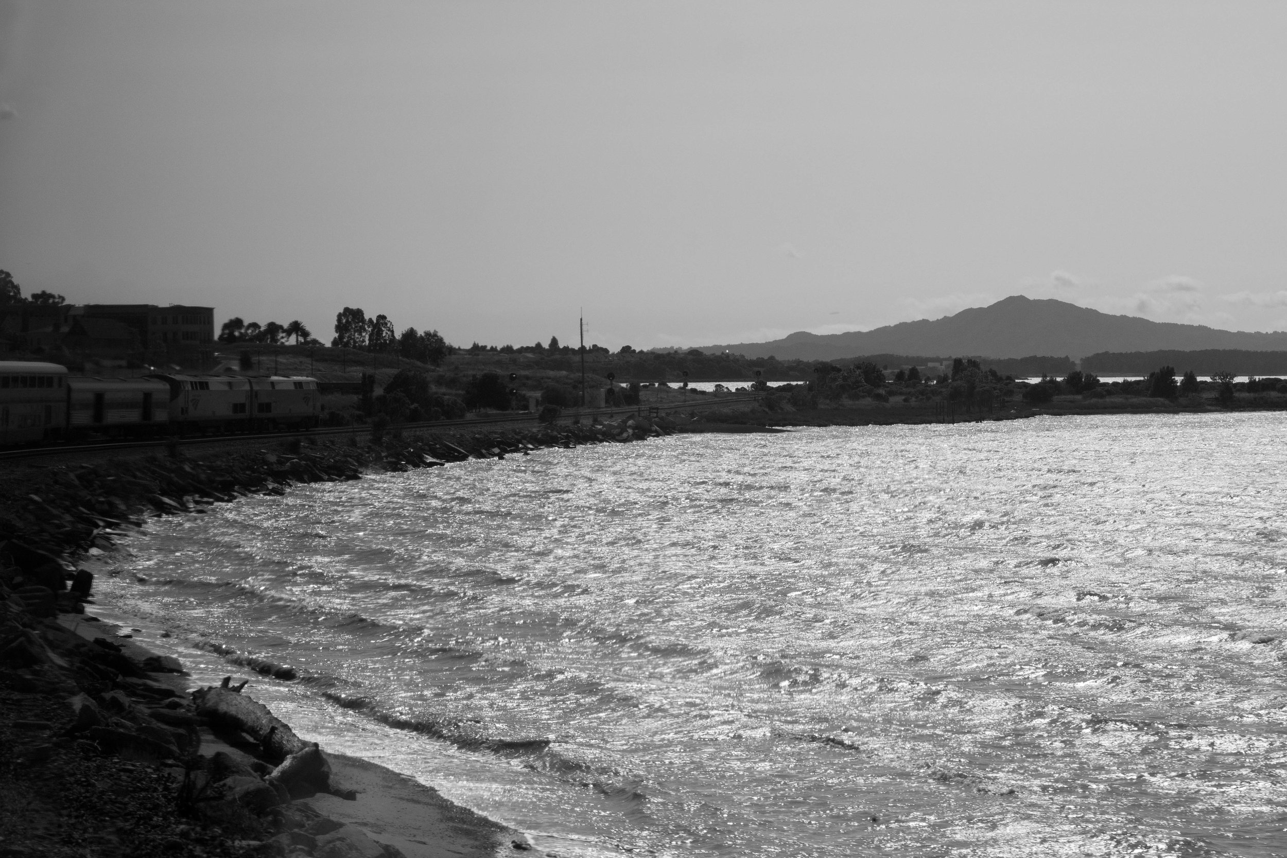  The train rolls along a bend in California. 