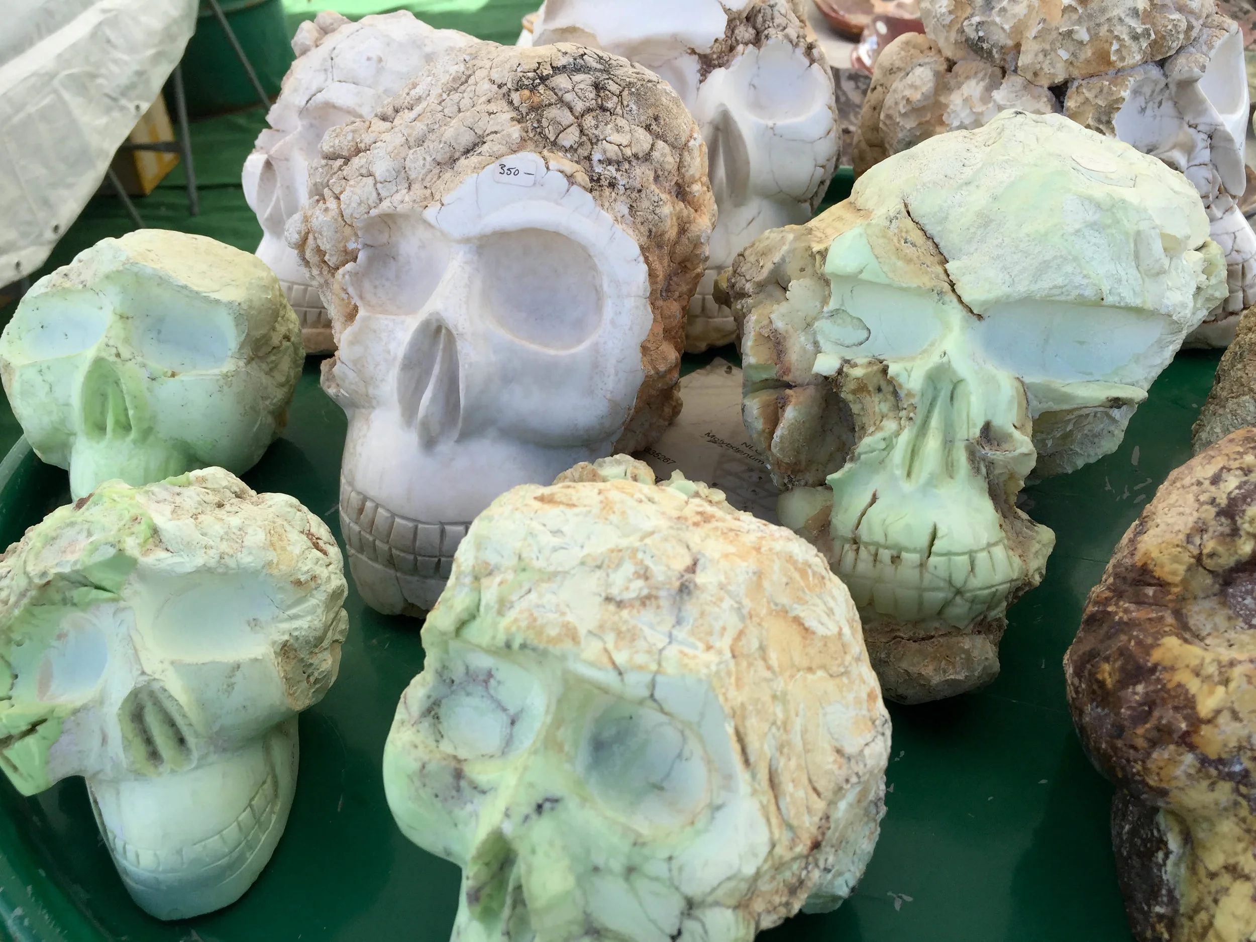 Skulls carved into rocks for sale at the gem show in Quartzsite, Arizona.