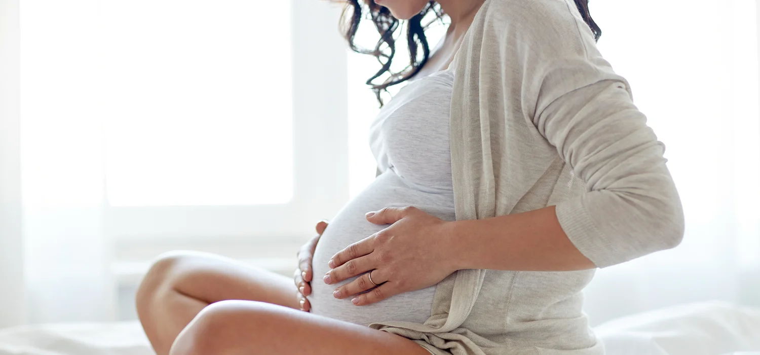 pregnancy-women-resting-on-bed.jpg