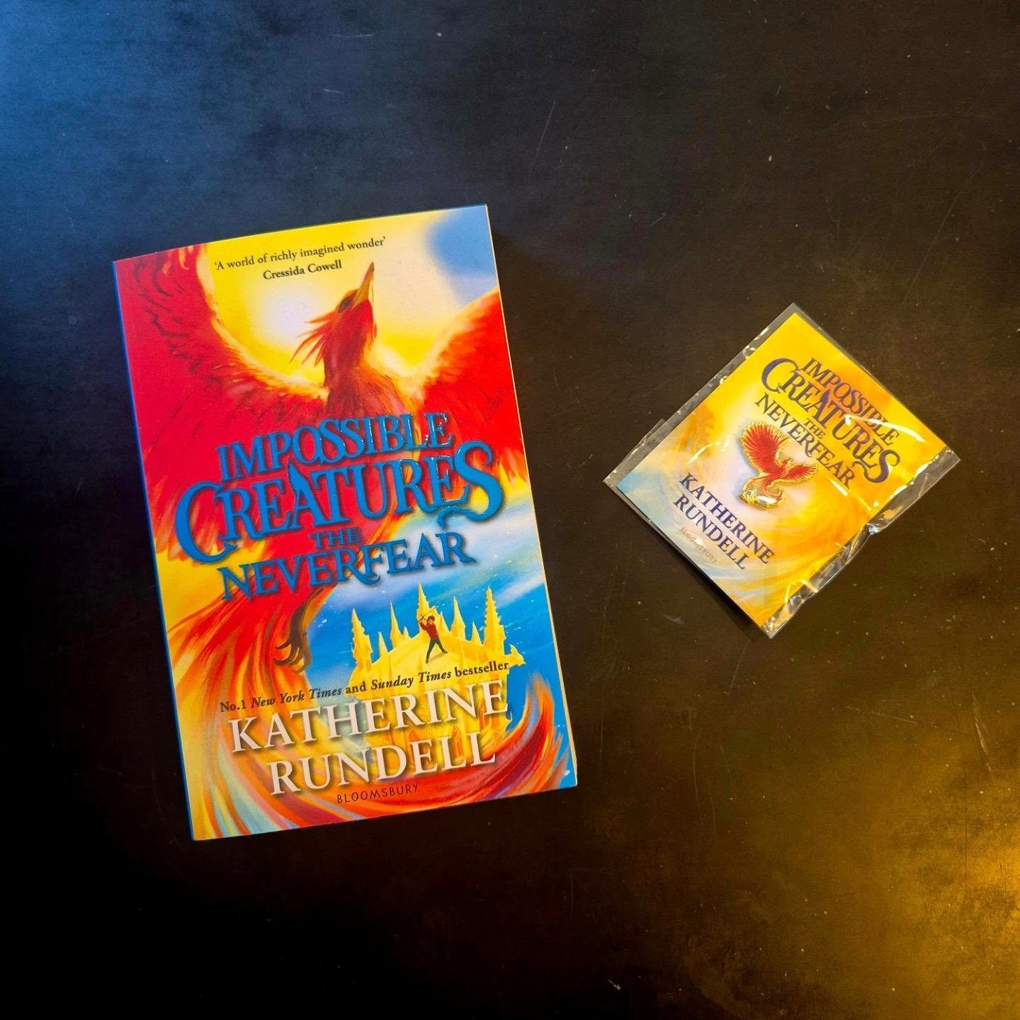 🔥 A Book We Loved 🔥 

It's here! It's here! The third book in Katherine Rundell's very loved Impossible Creatures series! ❤️ 

And what is this? A shiny ✨️ phoenix pin ✨️ to initiate you as a fellow adventurer and welcome you aboard the Neverfear ⛵