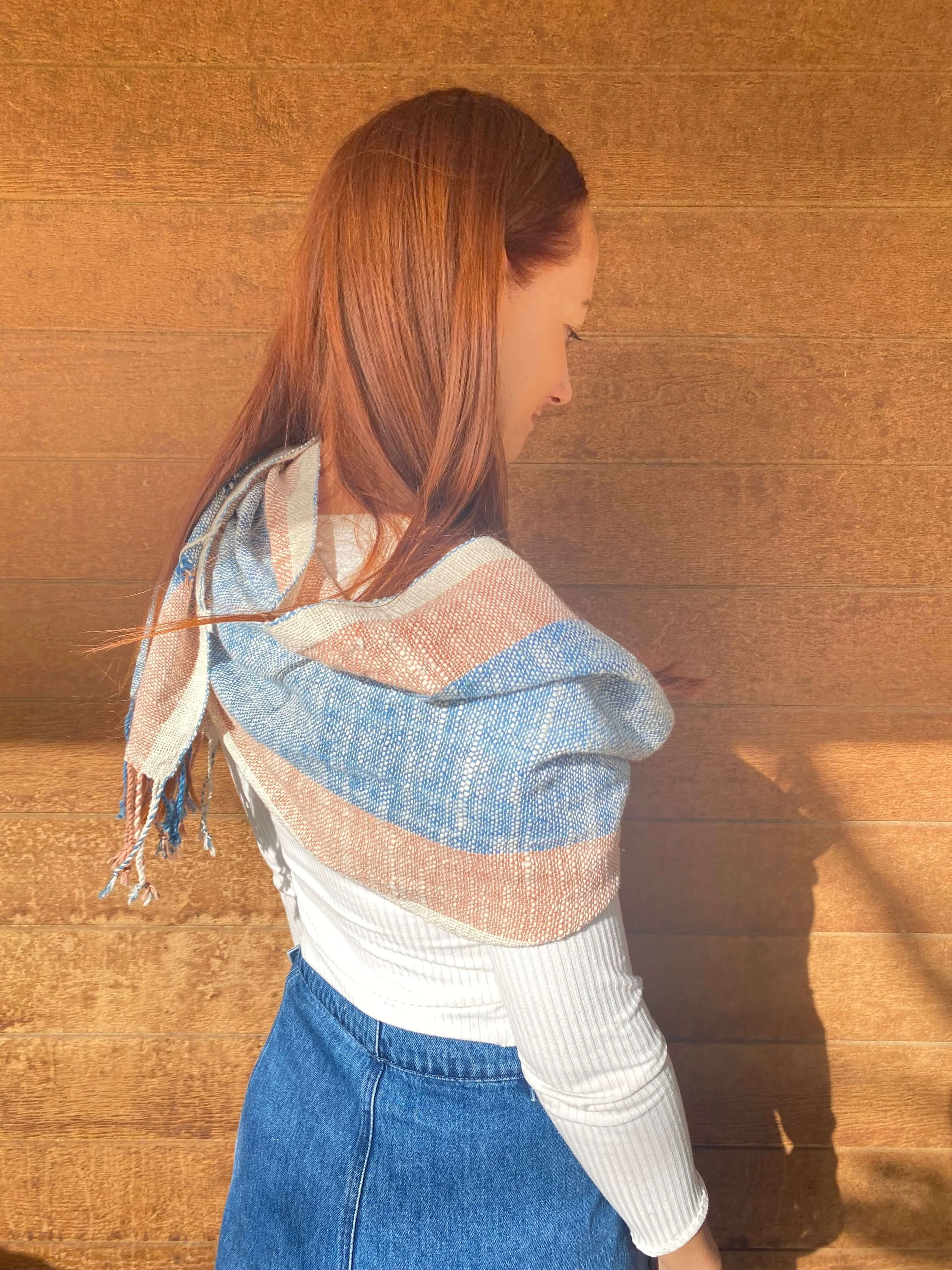 Lao Cotton Scarf Light Indigo Light Cinnamon over shoulder poncho shawl LOOM Designs.jpeg