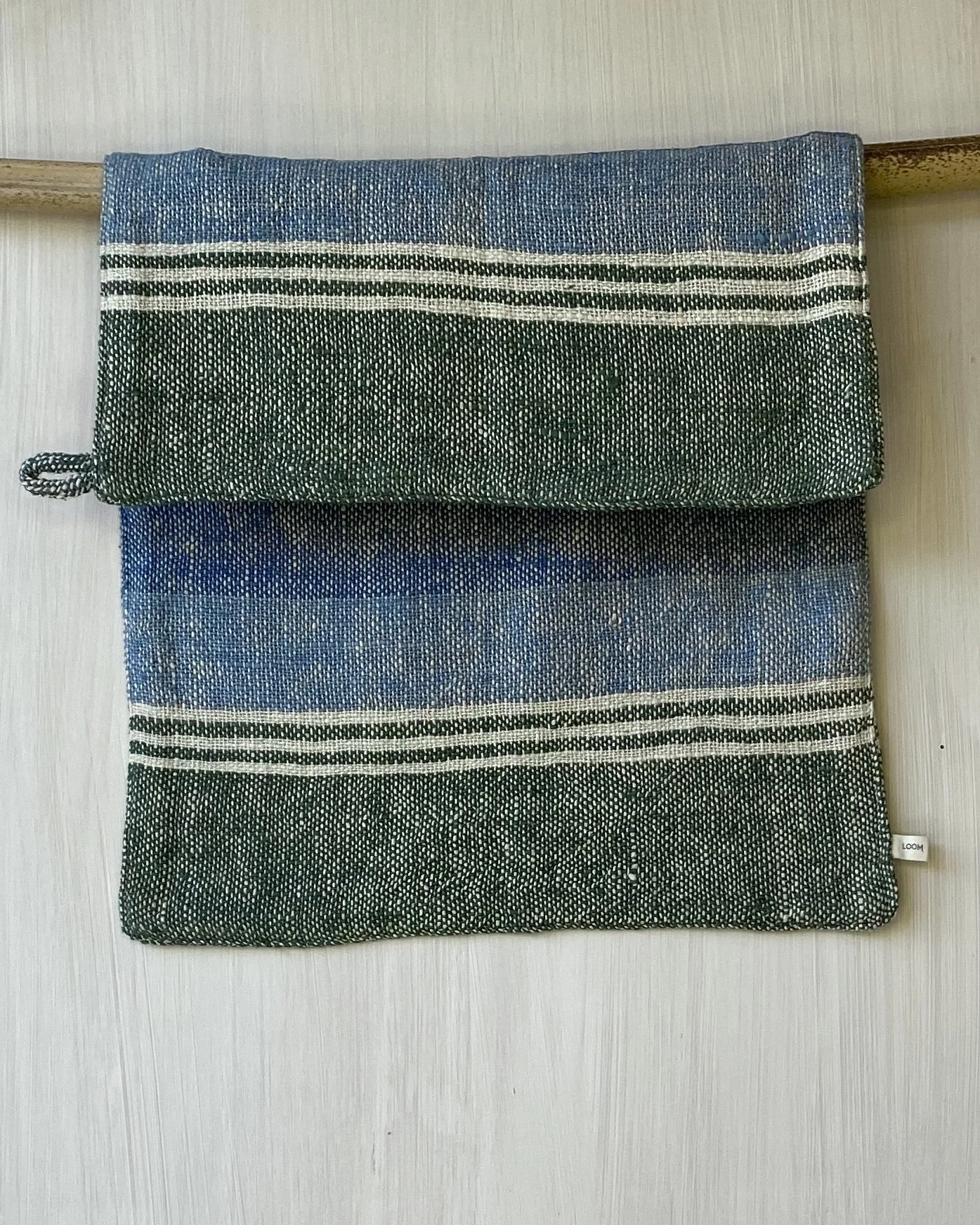 Hand Towel hanging on rod Green Indigo Stripe Loom Designs.jpg
