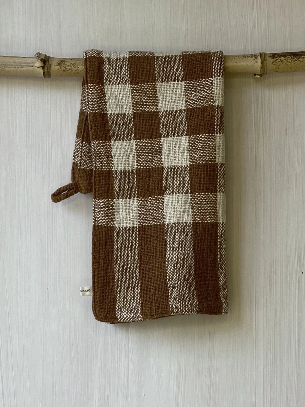 Hand Towel Cinnamon Check hanging folded in half on rod Loom Designs.jpg