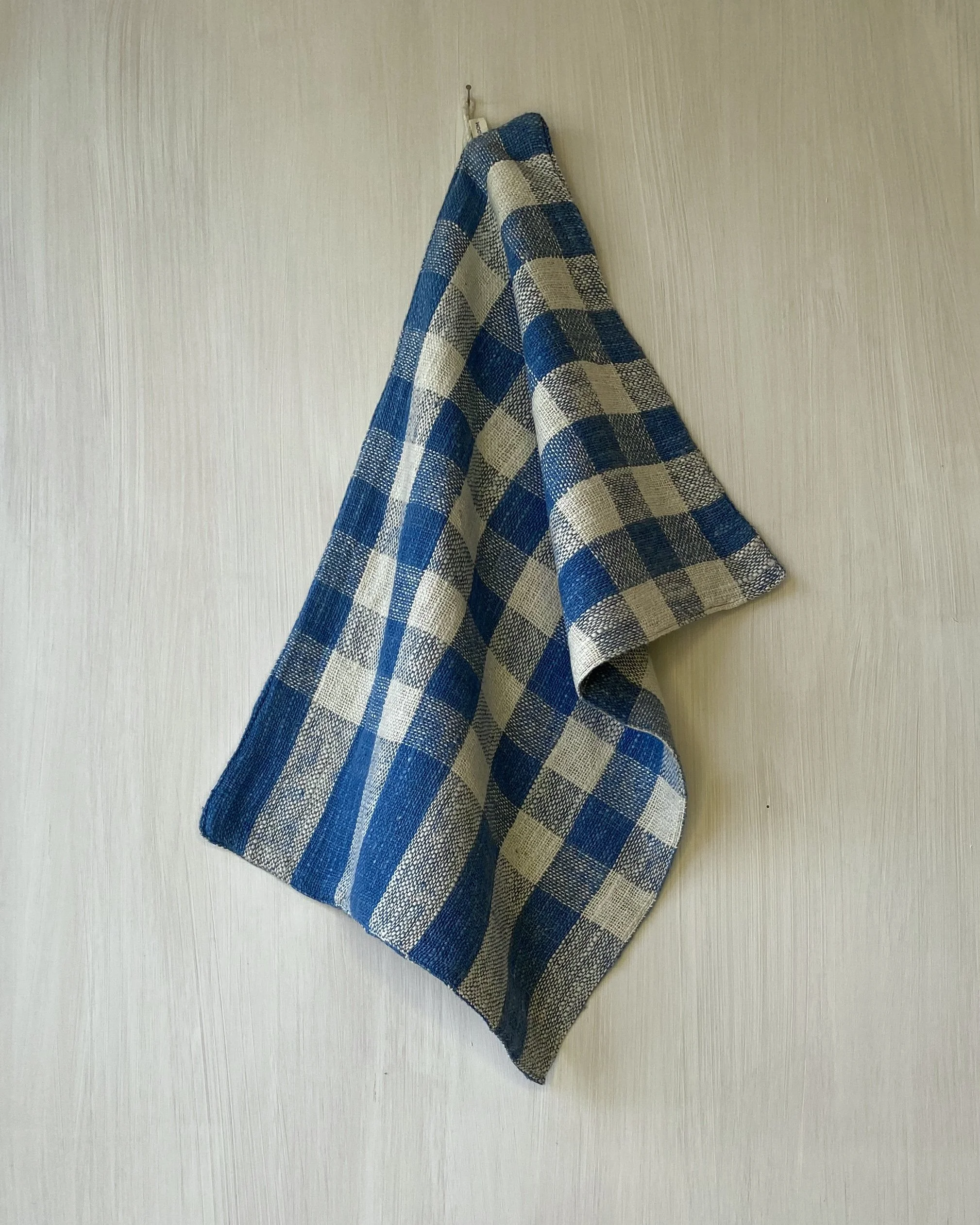 Hand Towel draped from hanging loop Indigo Check Loom Designs.jpg