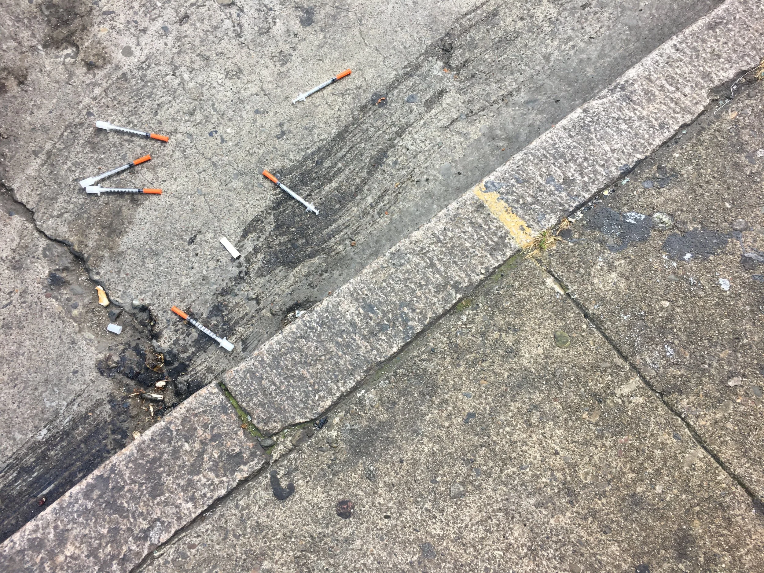 it is not uncommon to see a bouquet of needles on the ground in the tenderloin. this isn't a sign of danger like most people would suspect... this is a sign that someone needs help. 