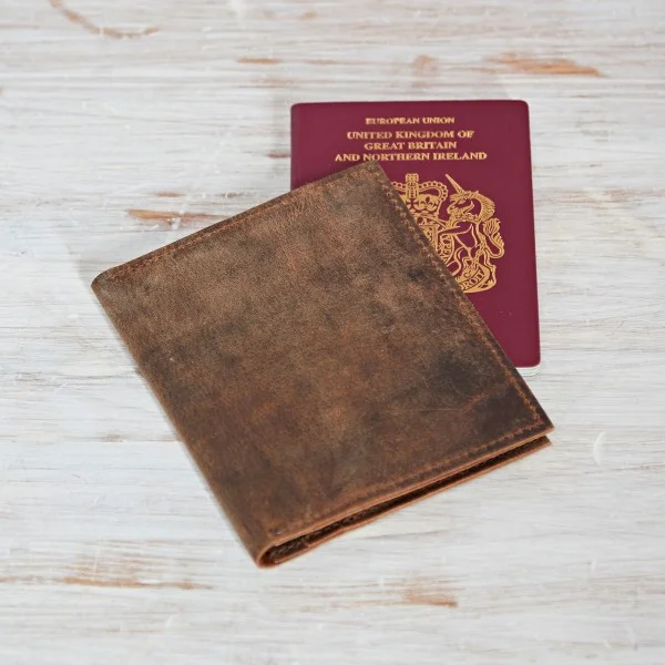 hibph_buffalo_leather_passport_holder_closed_props_high_res_7.jpg