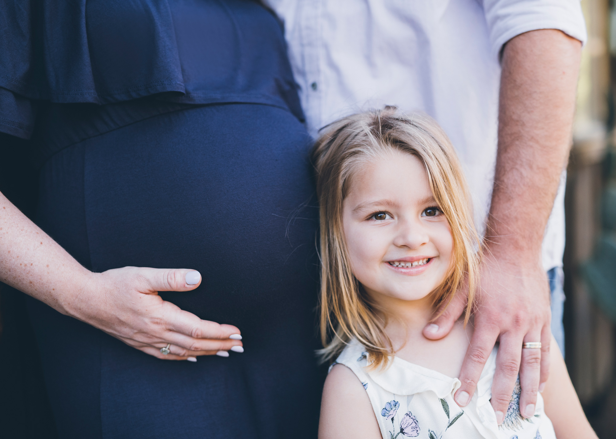 close-up-shot-of-the-bump-and-big-sister.jpg