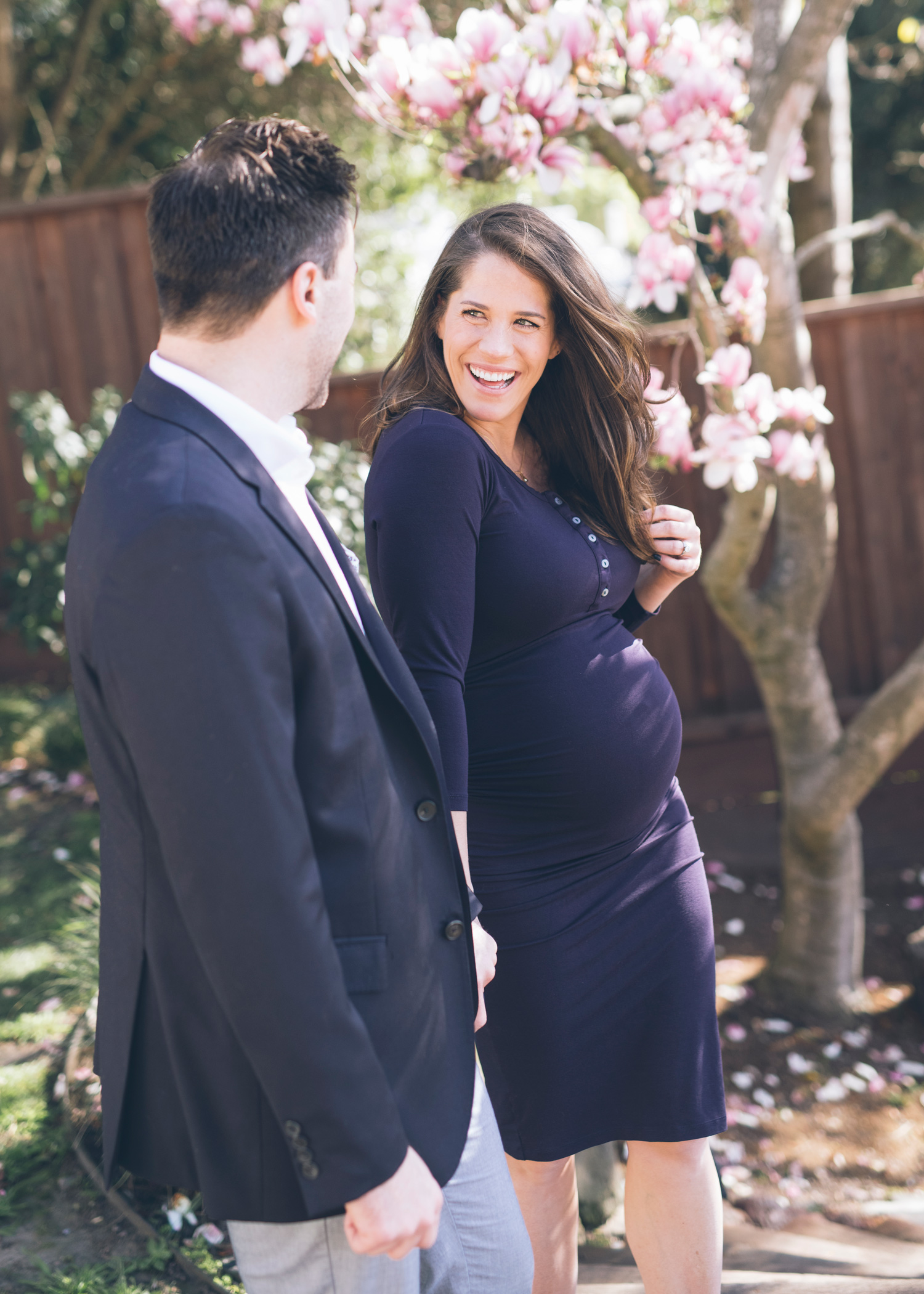 beautiful-pregnant-wife-looking-at-her-husband-with-a-huge-smile.jpg