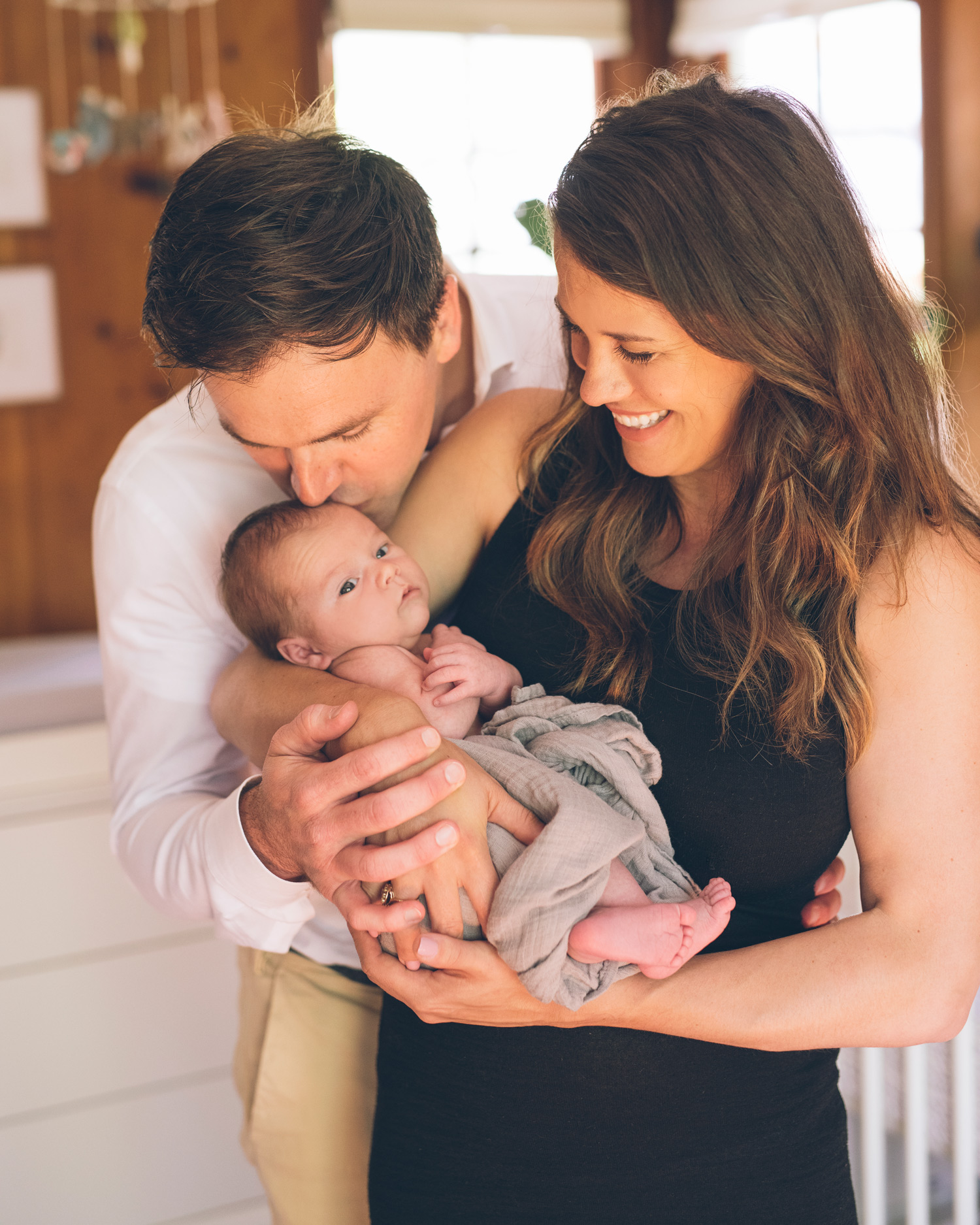 father-kissing-his-newborn-baby-boy.jpg