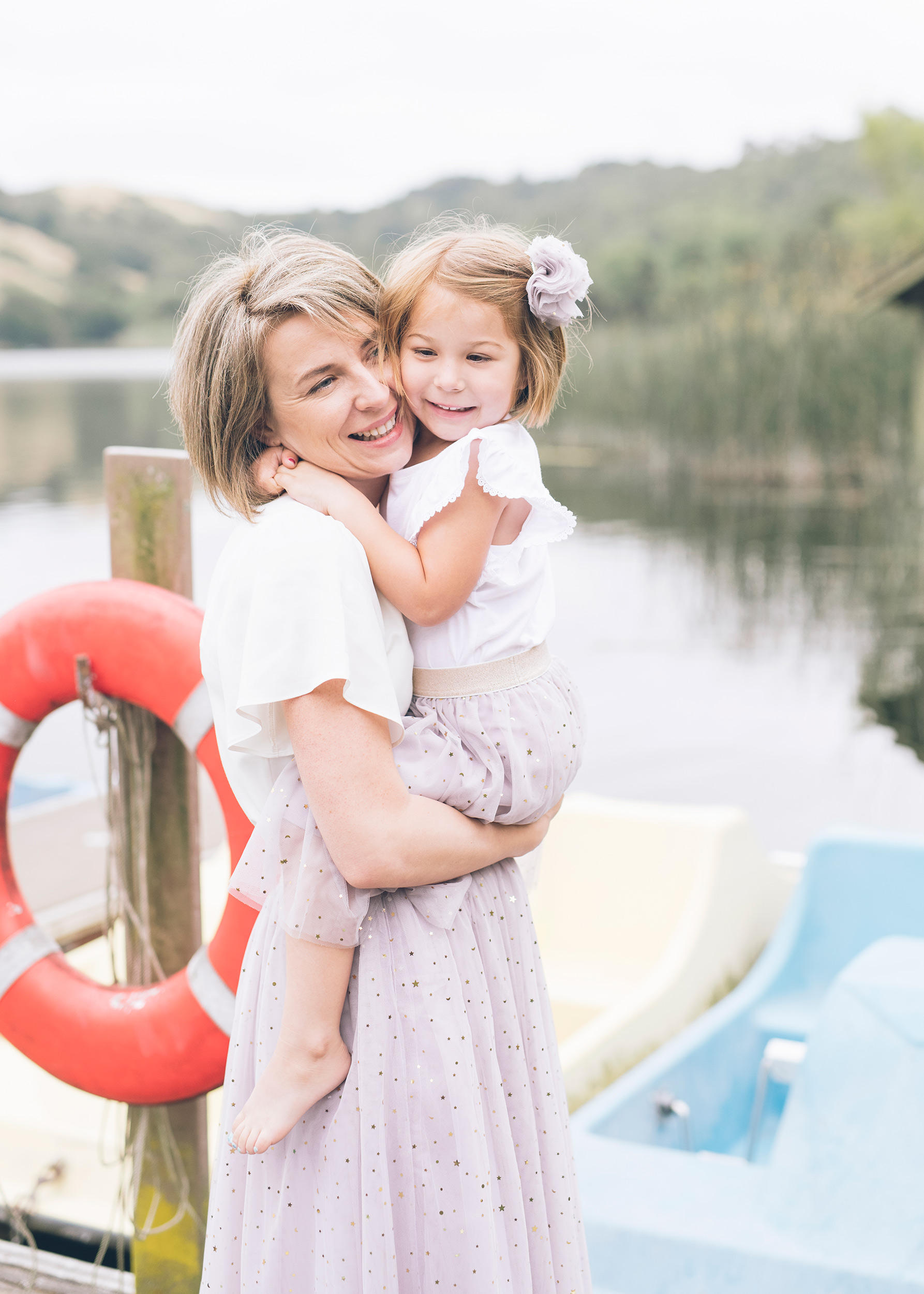 mother-holding-daugher-at-the-lafayette-reservoir-dock.jpg