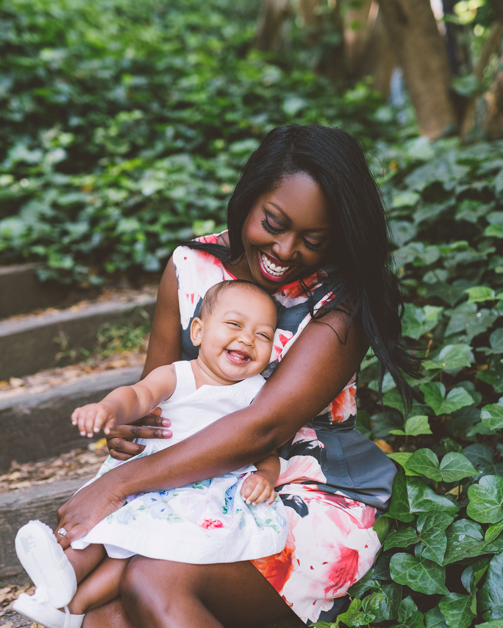 mother-holding-her-daughter-in-berkeley-rose-garden.jpg