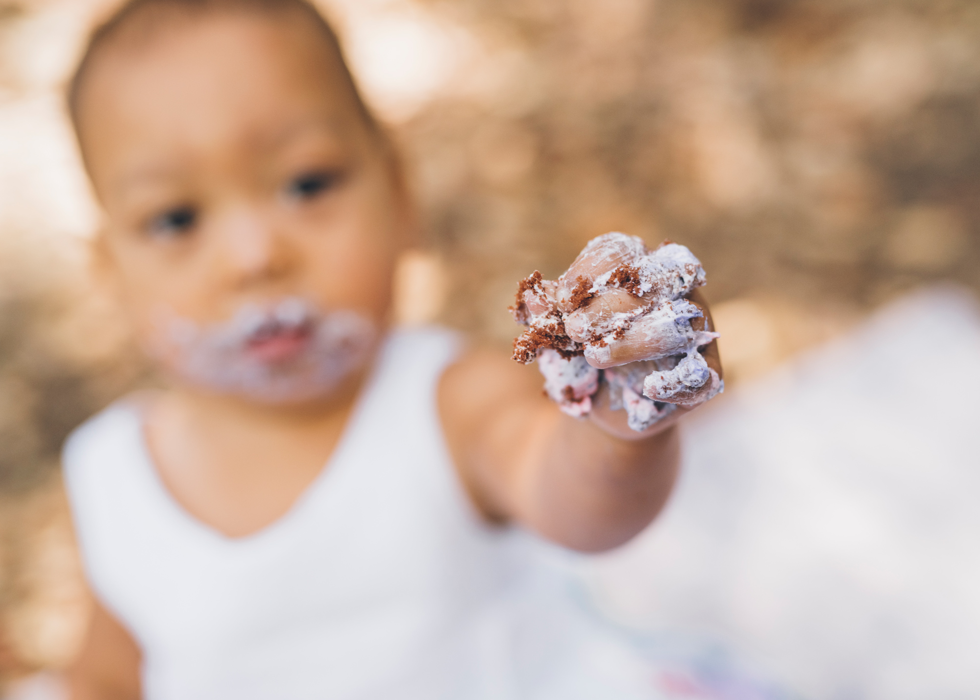 baby's-hand-covered-in-cake.jpg