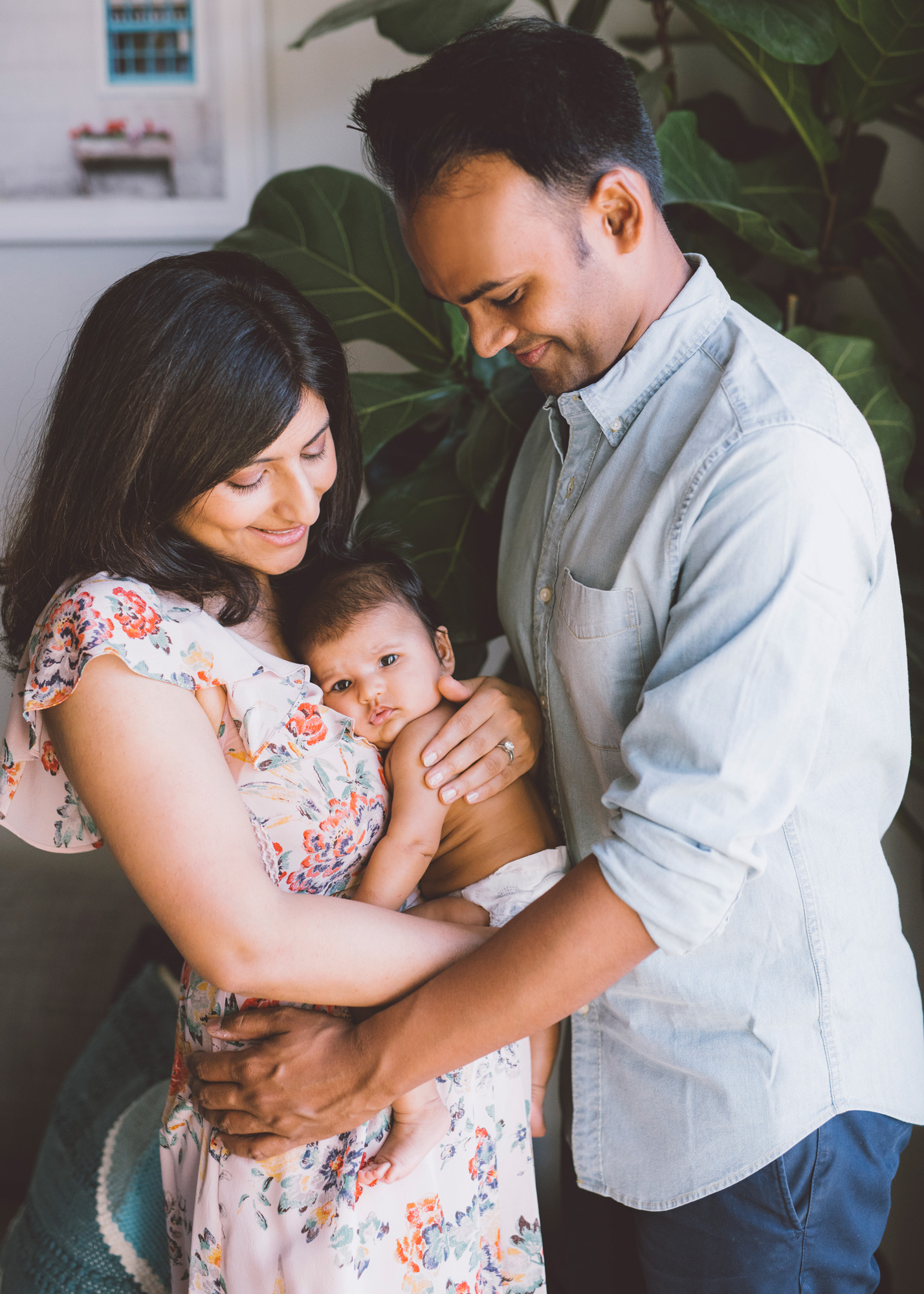 parents-with-baby-girl-photo-in-apartment-in-san-francisco.jpg